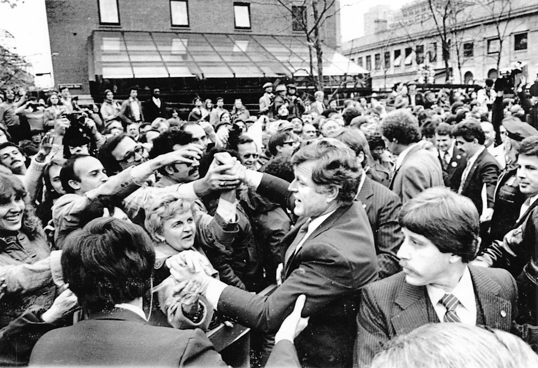 Senator Edward Kennedy shook hands outside Faneuil Hall in 1979 when he announced his decision to run for president. A draft movement helped sway Kennedy to run.