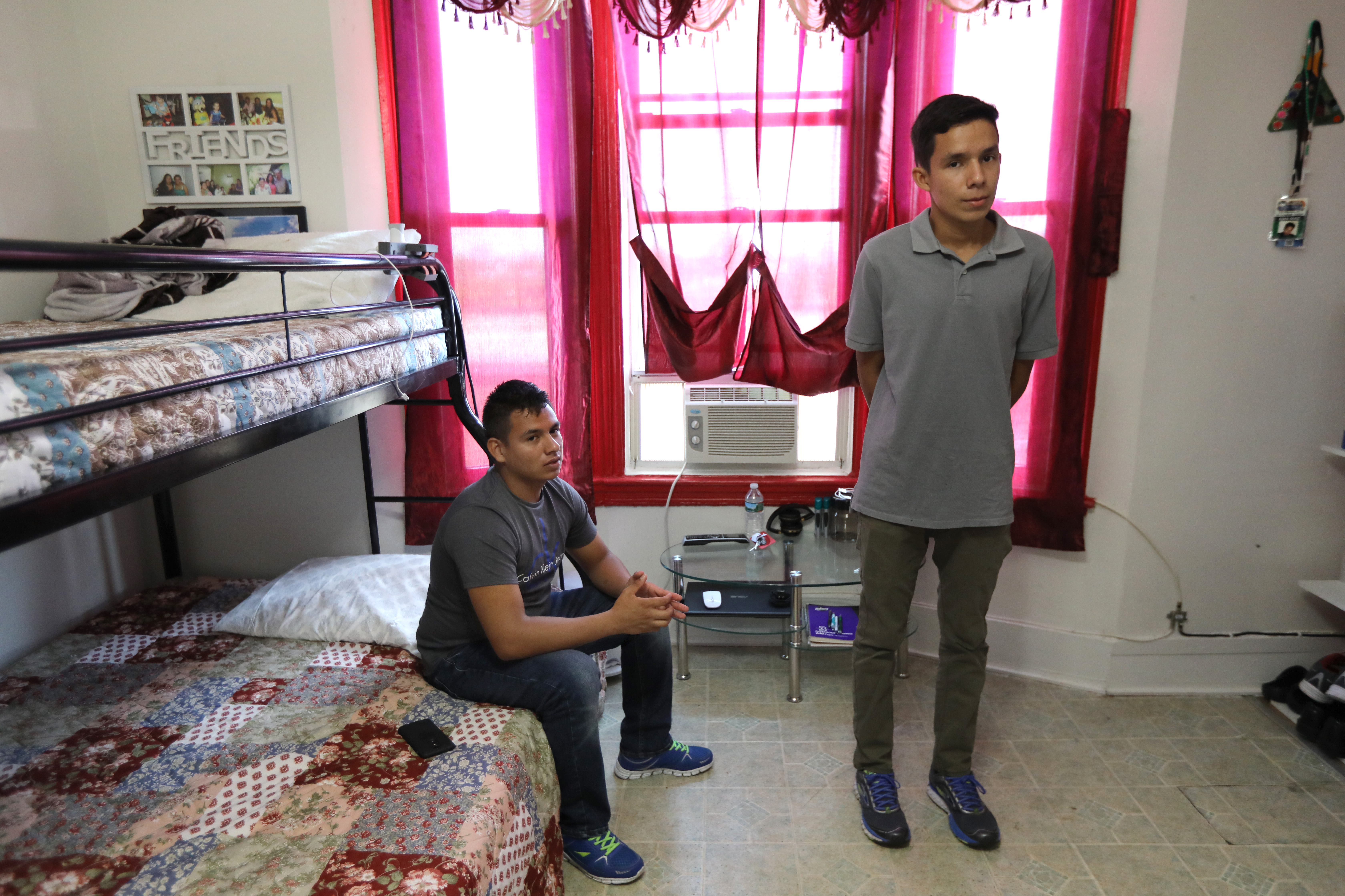 The brothers sleep in bunk beds set up in the living room of their uncle’s apartment.