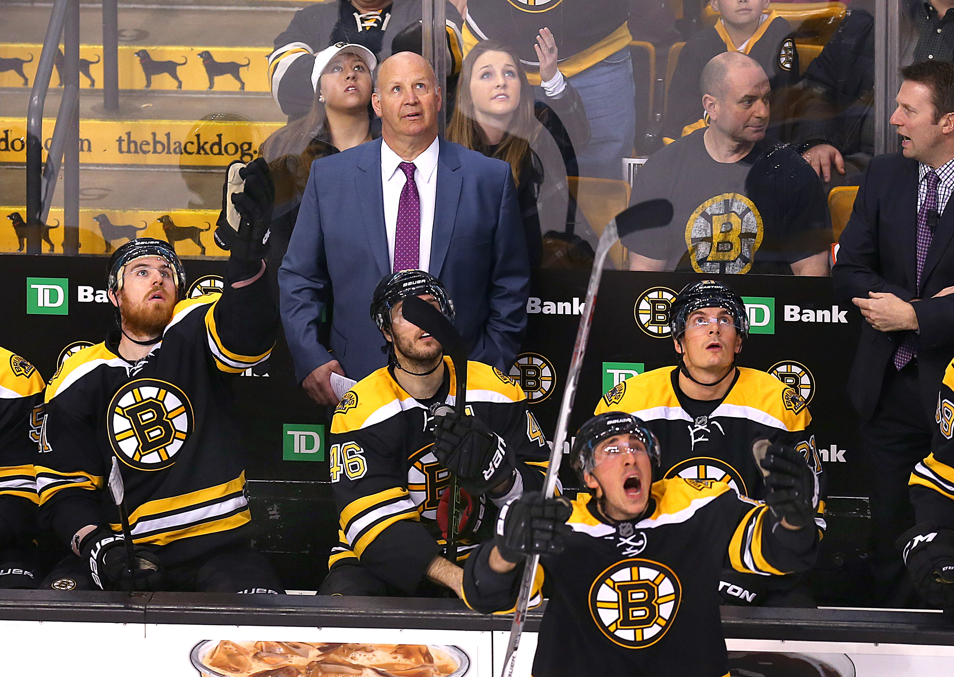 Claude Julien and his players watched the replay screen and reacted to the officials’ no-goal call.