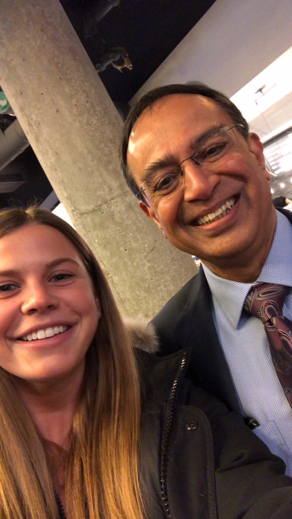 Getting a “selfie with Swamy” is now part of the UMass senior bucket list. Here he poses with Anna Nilsson in the Campus Center.
