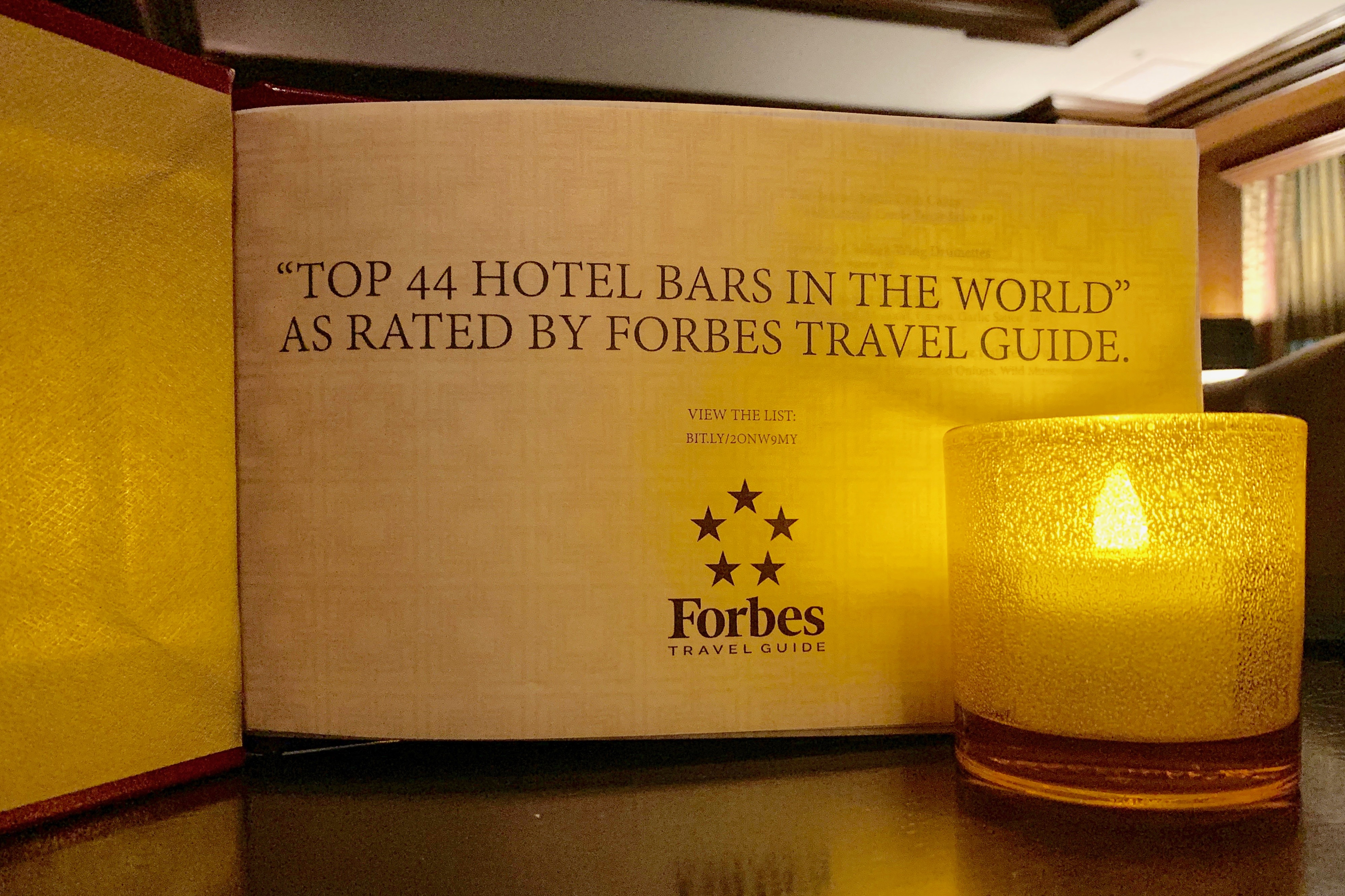 The first page in the menu at the Boston Harbor Hotel bar lets customers know it was recently named one of the top 44 hotel bars in the world.