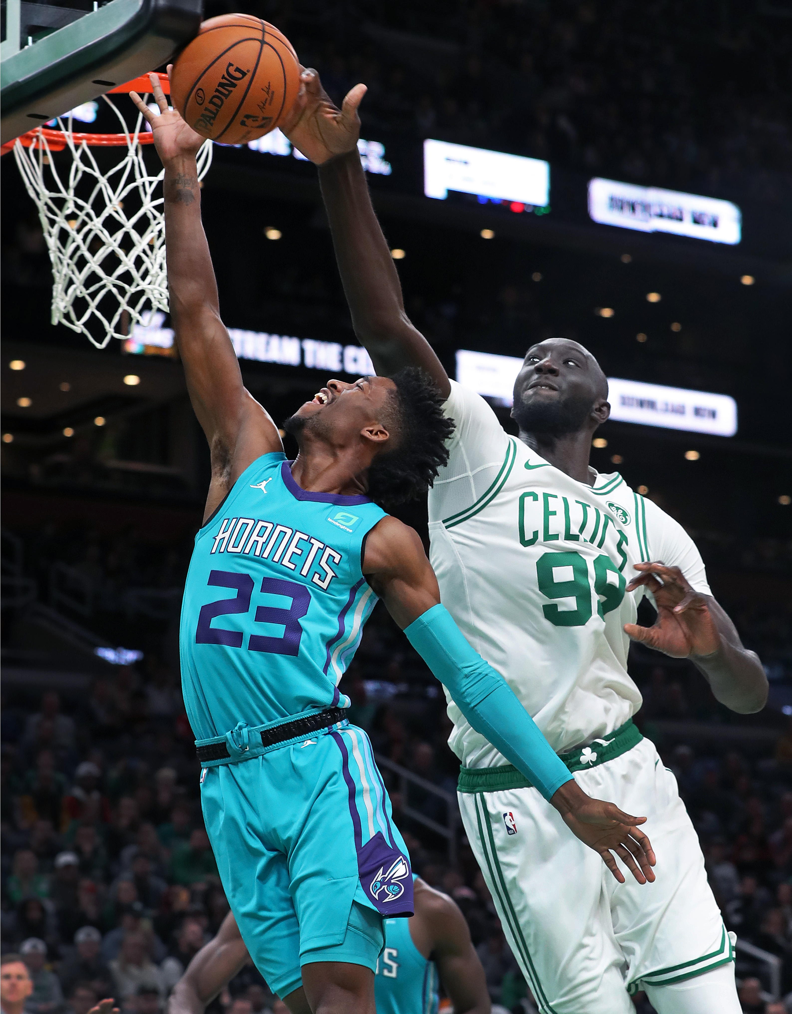Boston MA: 10-6-19: Moments after entering the game in the fourth quarter, Celtics rookie Tacko Fall rejected a shot by the Hornets’ Kobi Simmons.
