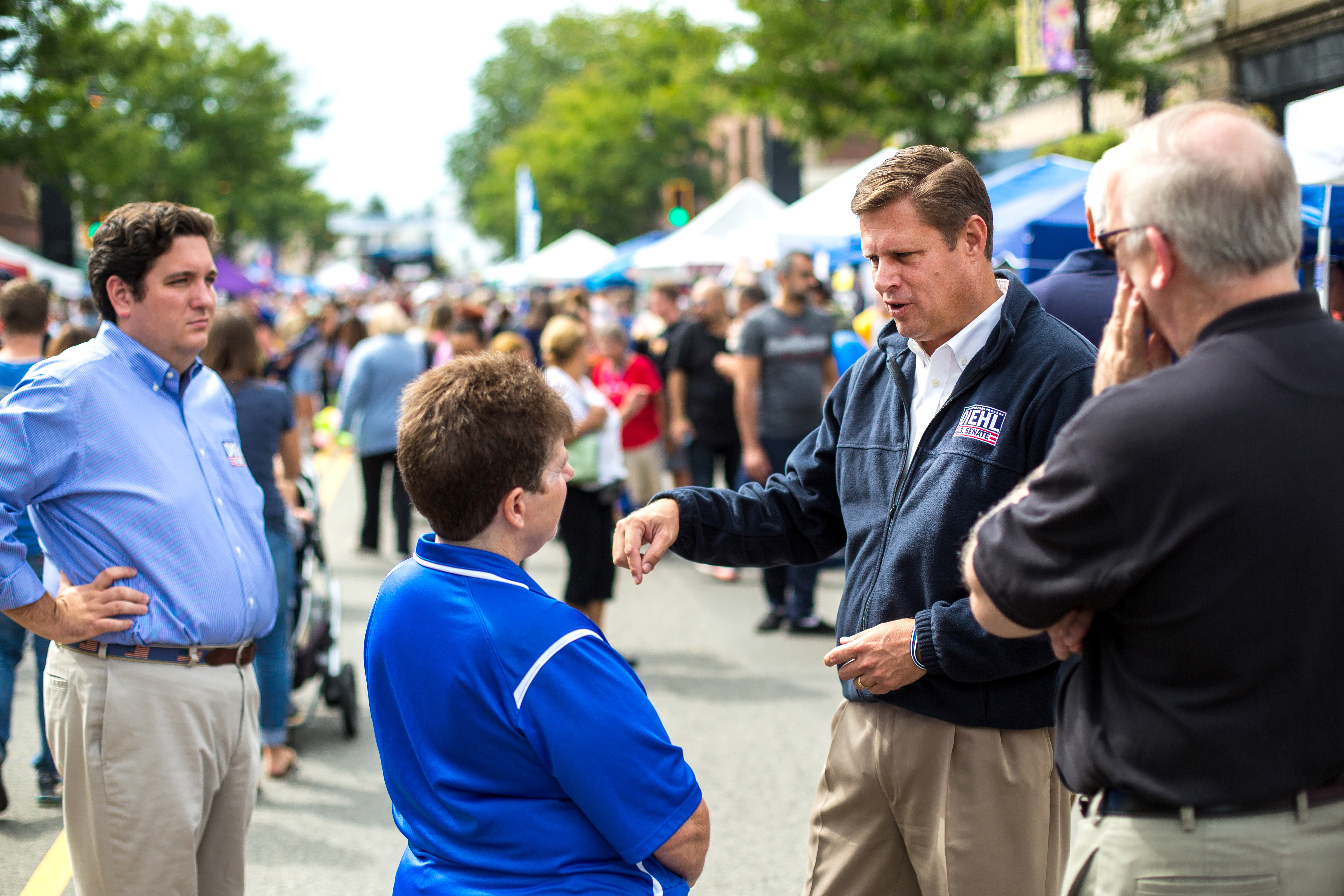 Diehl (right) greeted Anne Marie Bustler and Tom Maloney in Norwood.