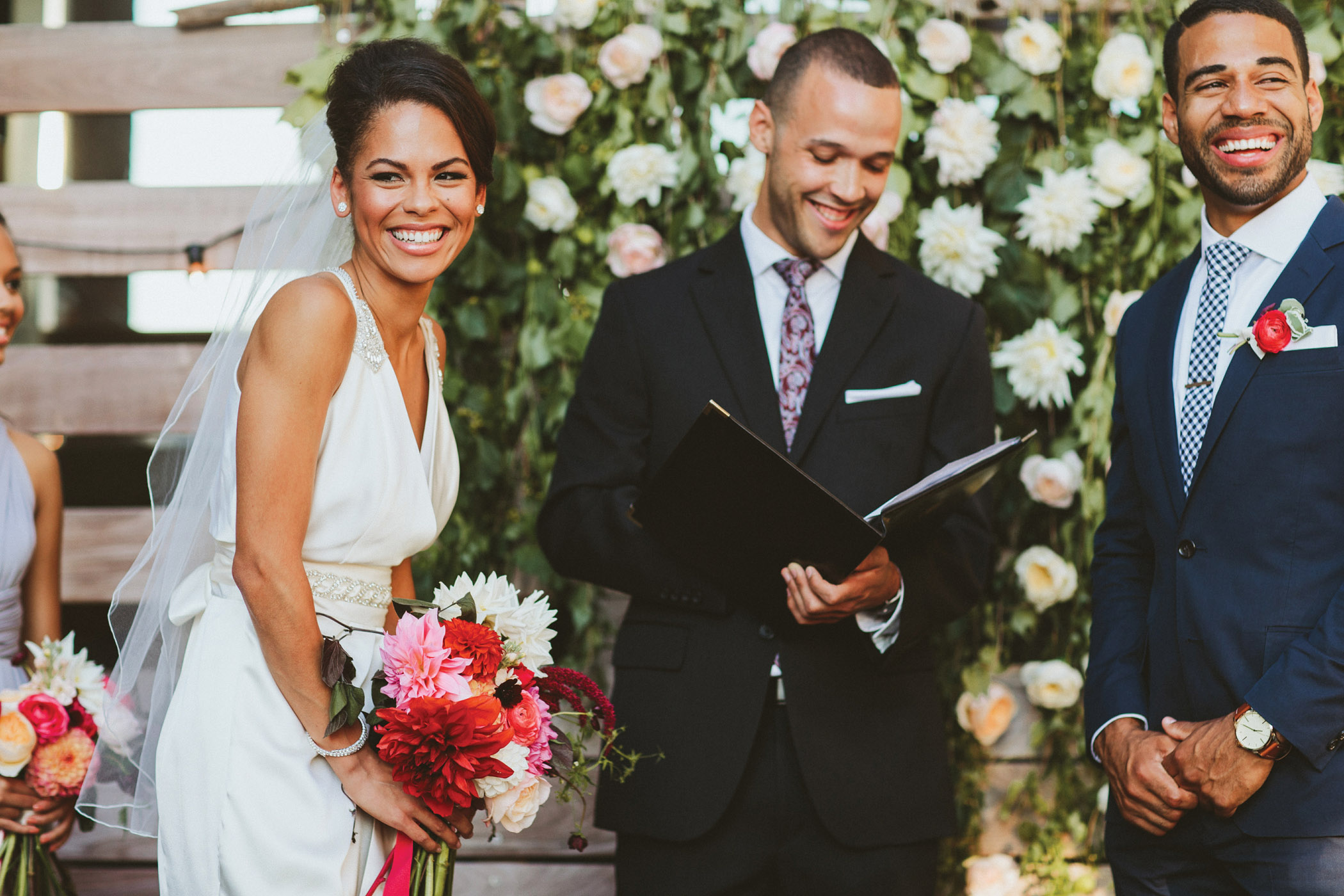 Laura chose a sleek gown from David’s Bridal.