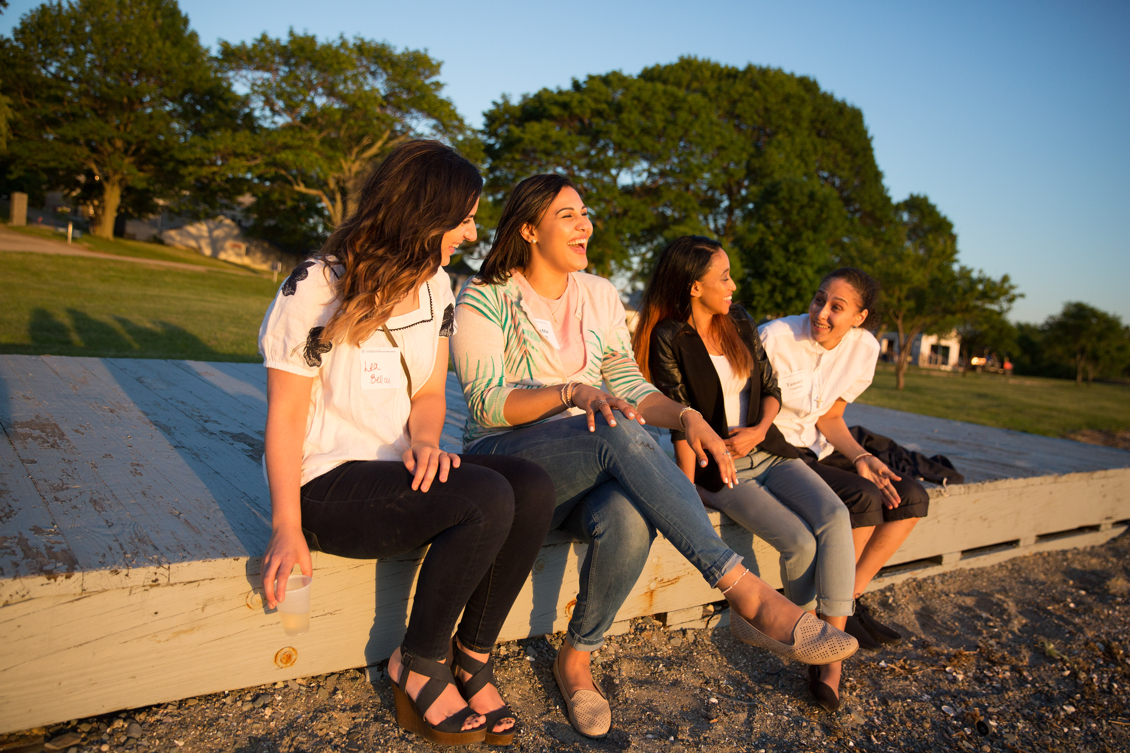 Guests (from left) Lea Bellai, Zynetta Canning, Ana Rivera, and Tammy Canning enjoyed sunset during a Thompson Island event open house.