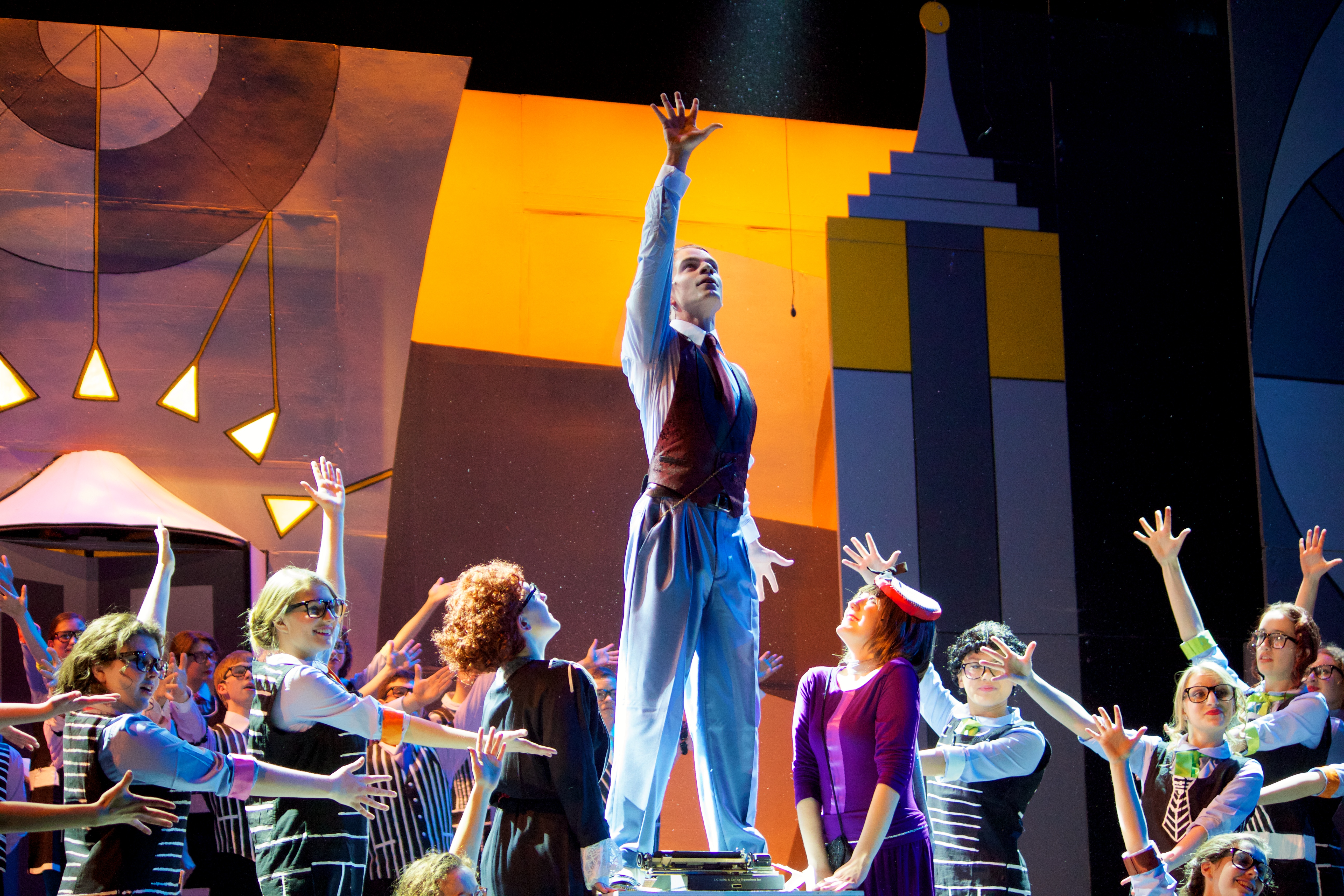 Cast members in a scene from the musical “Thoroughly Modern Millie” at Newton North High School.