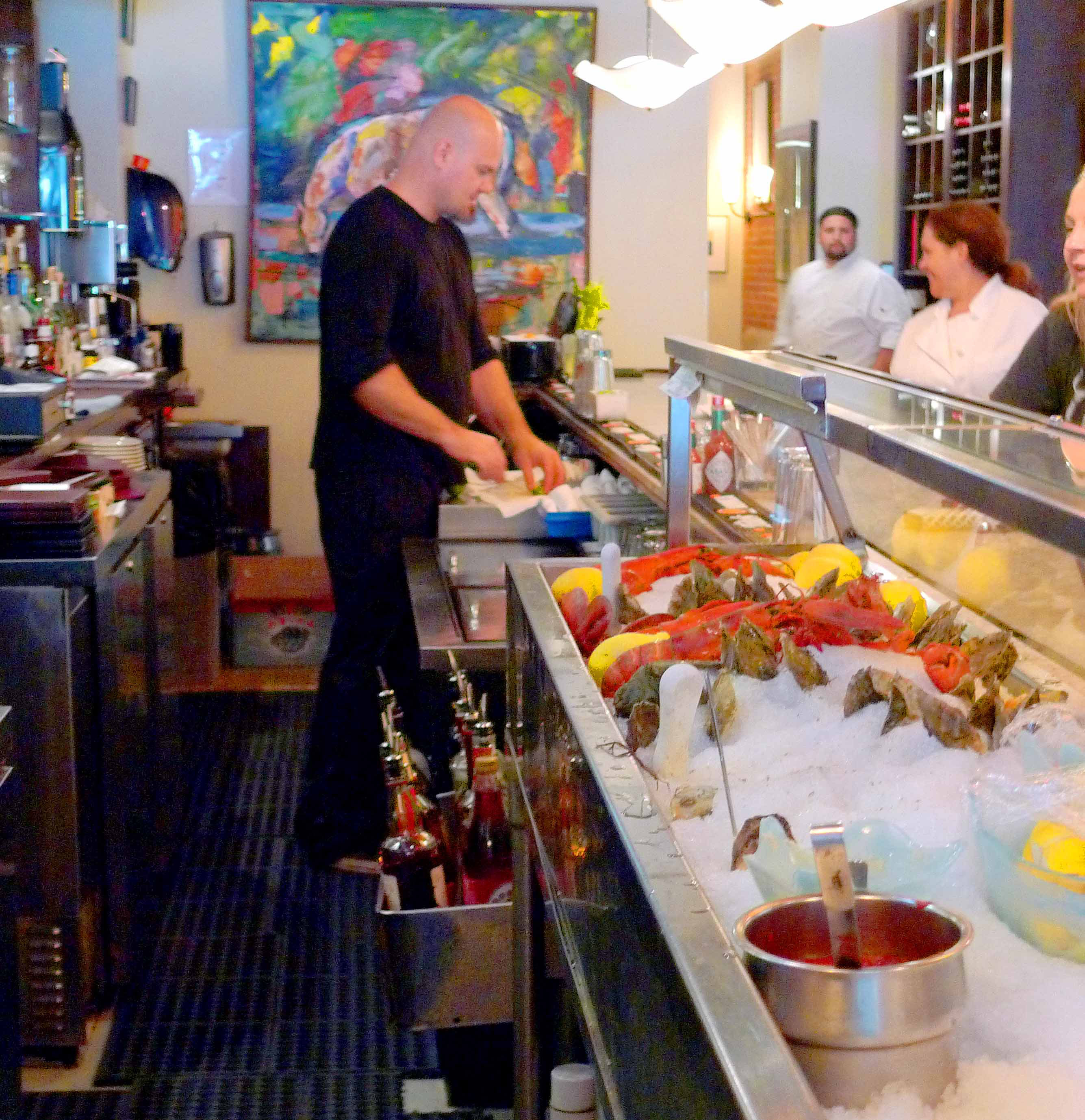 The raw bar is the main attraction at the Naked Oyster in Hyannis.