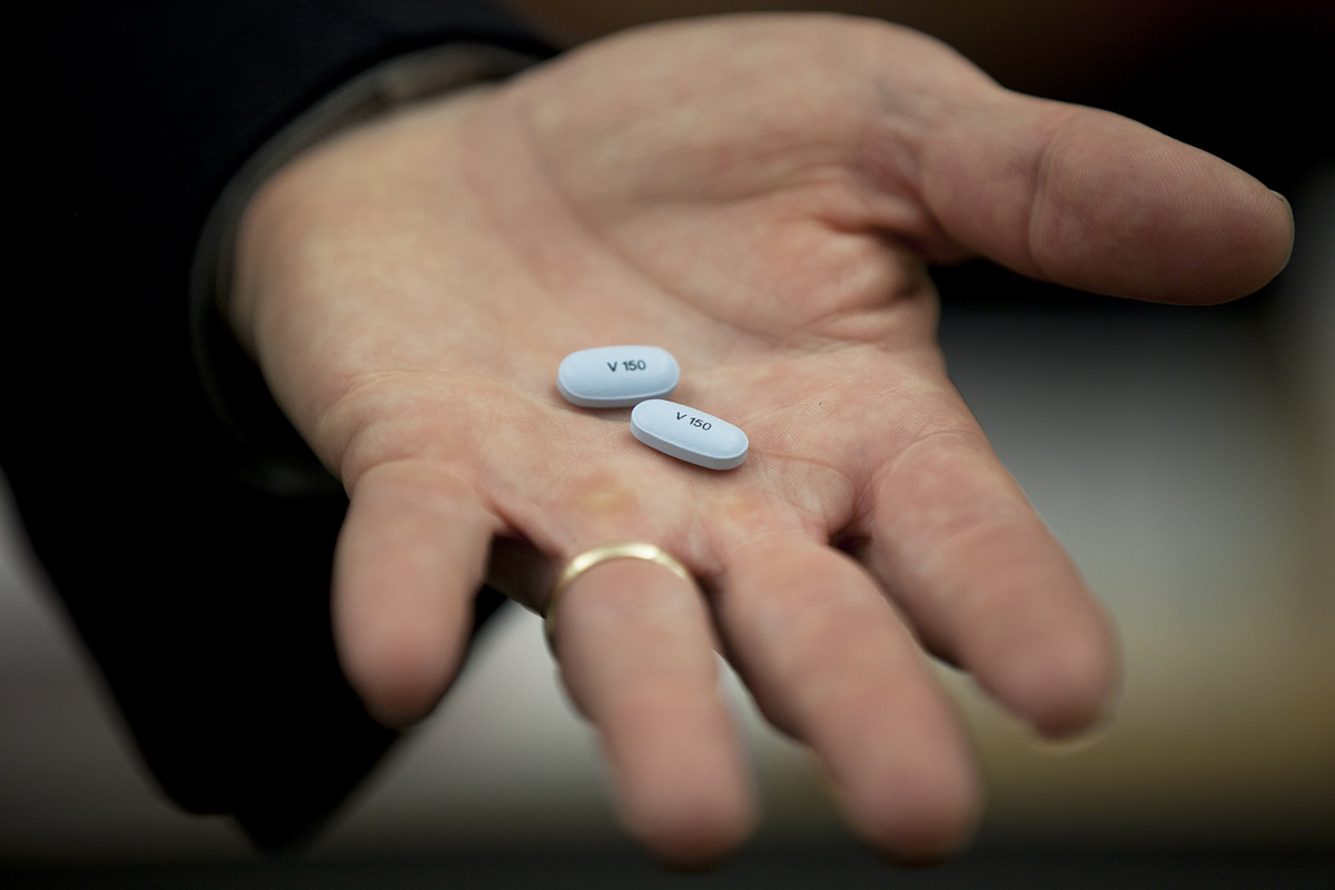 Eric Olson, vice president of the Cystic Fibrosis Franchise at Vertex Pharmaceuticals, held two Kalydeco pills.