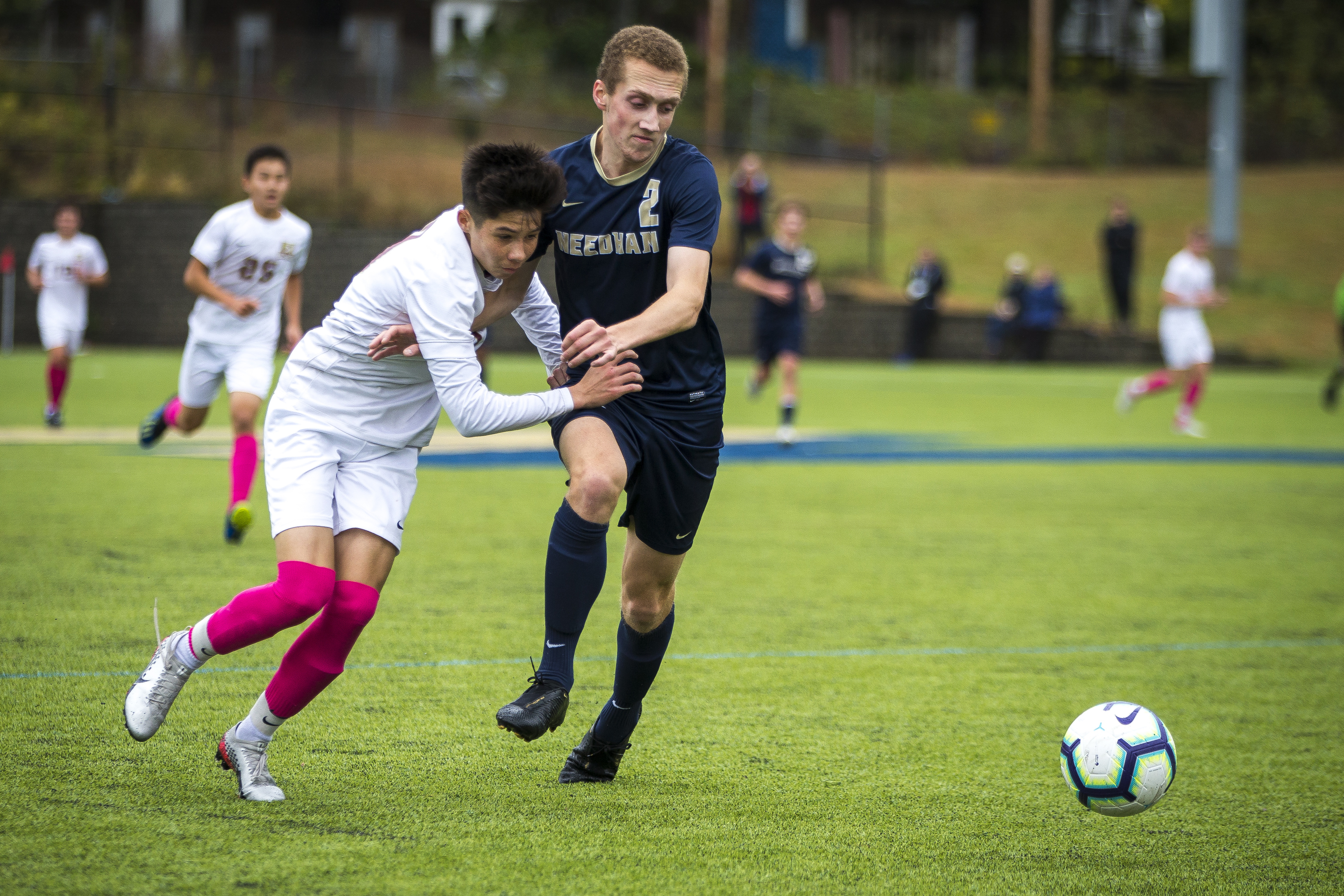 BC High’s Gabe Pichay (left) and Needham’s Matthew Maslow fight for the ball during a recent BSC clash.