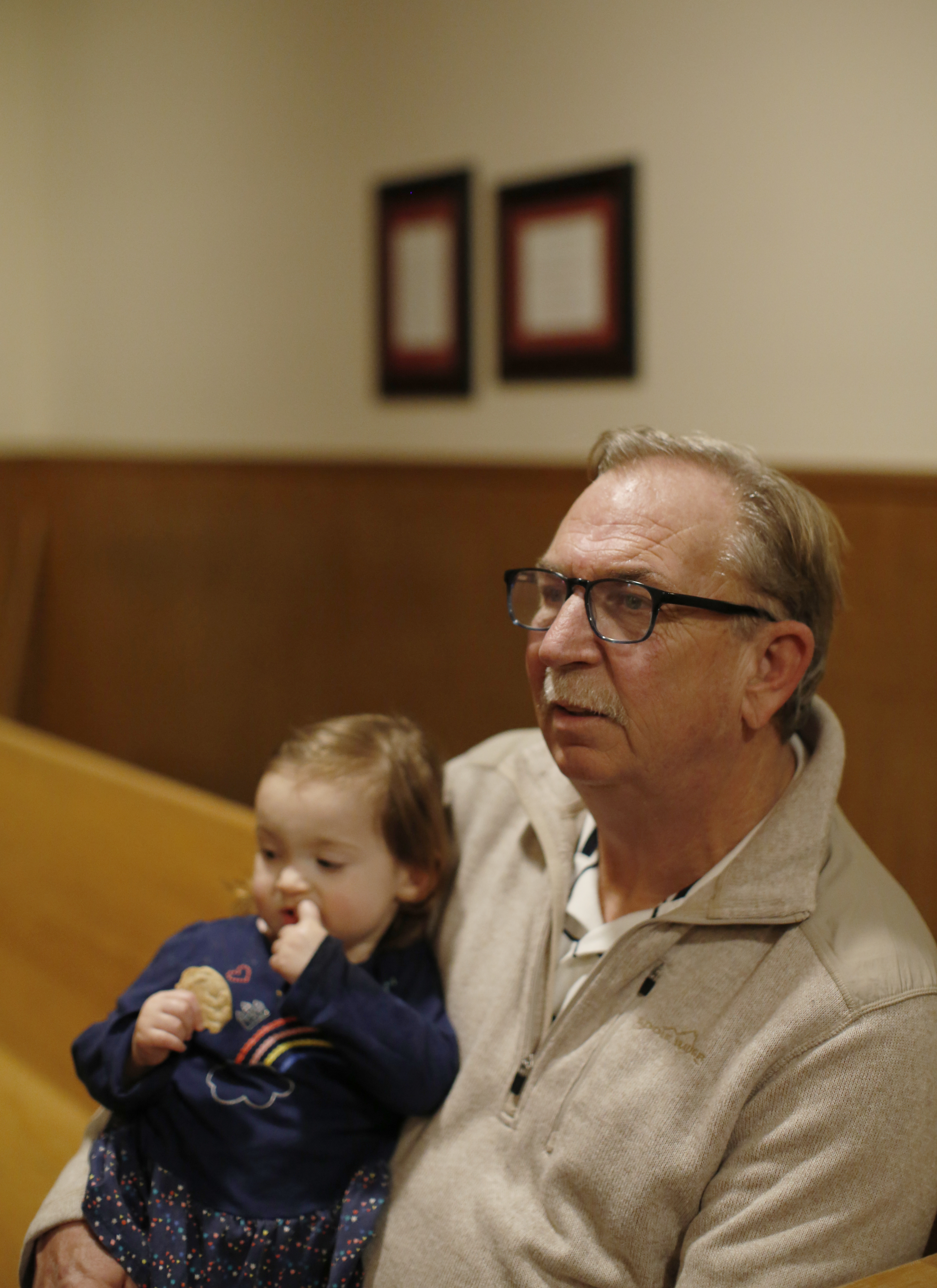 Bob Quinlivan, brother of fire victim John Quinlivan, visited St. George Catholic Church.