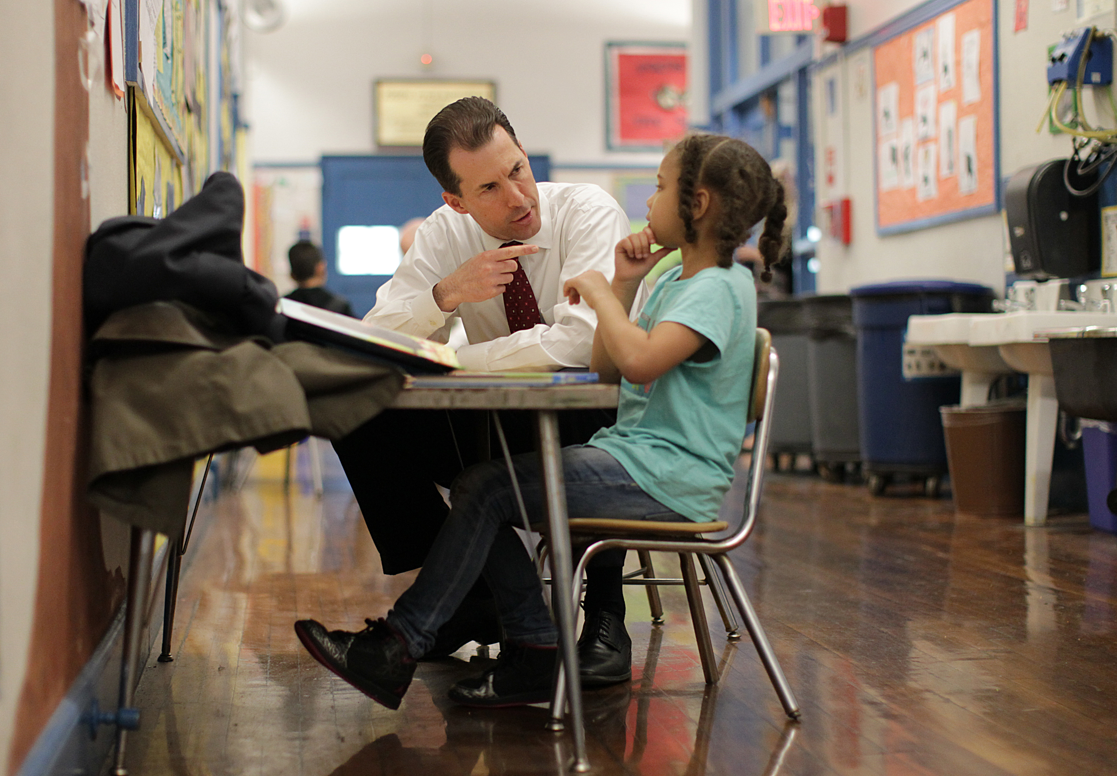 John Sgroi (left) of Natixis partnered with student Ariana Betances at the Winthrop School.