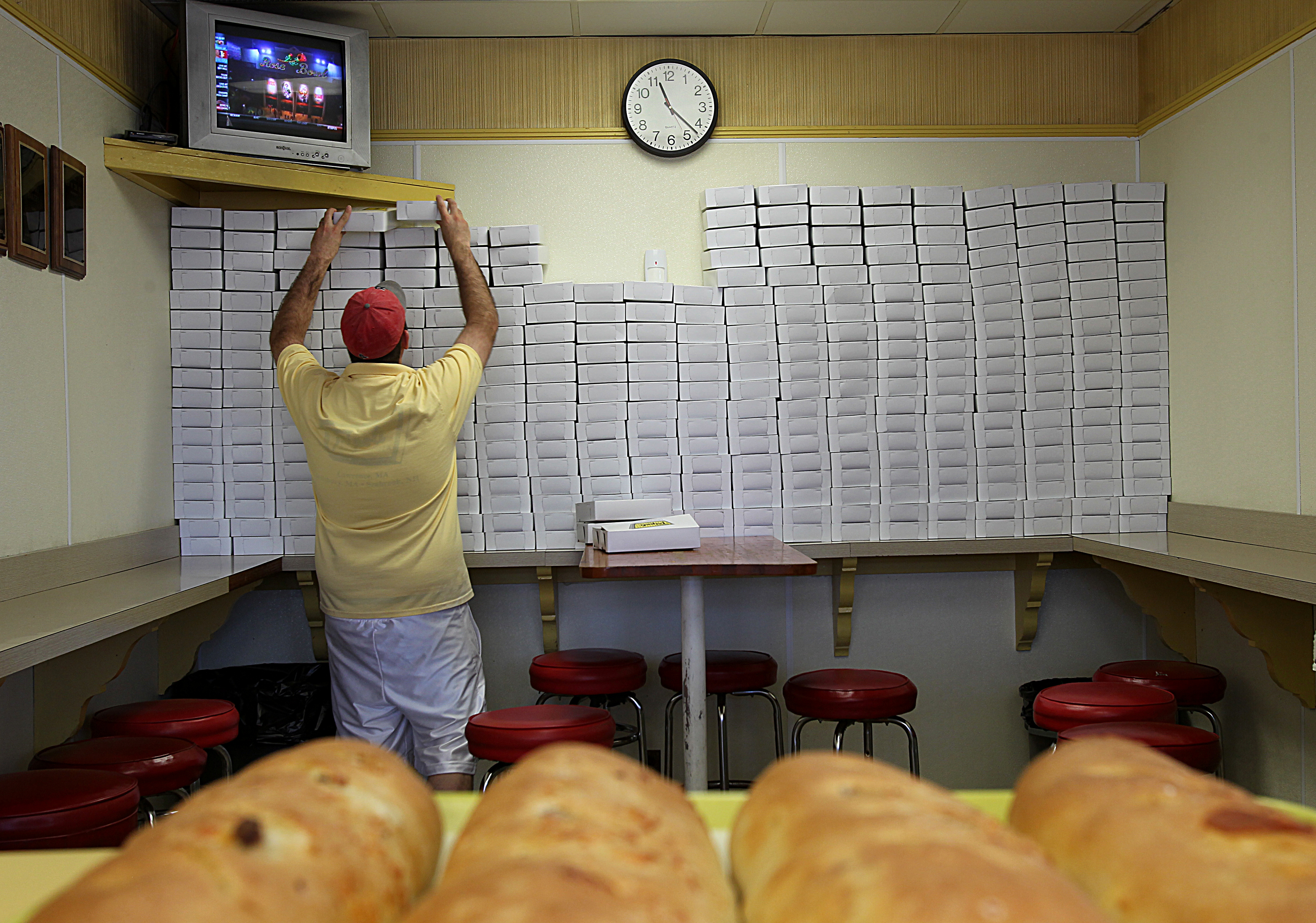 The two-slice boxes are stacked and ready for slices of the pizza that has only added to the bakery’s popularity.