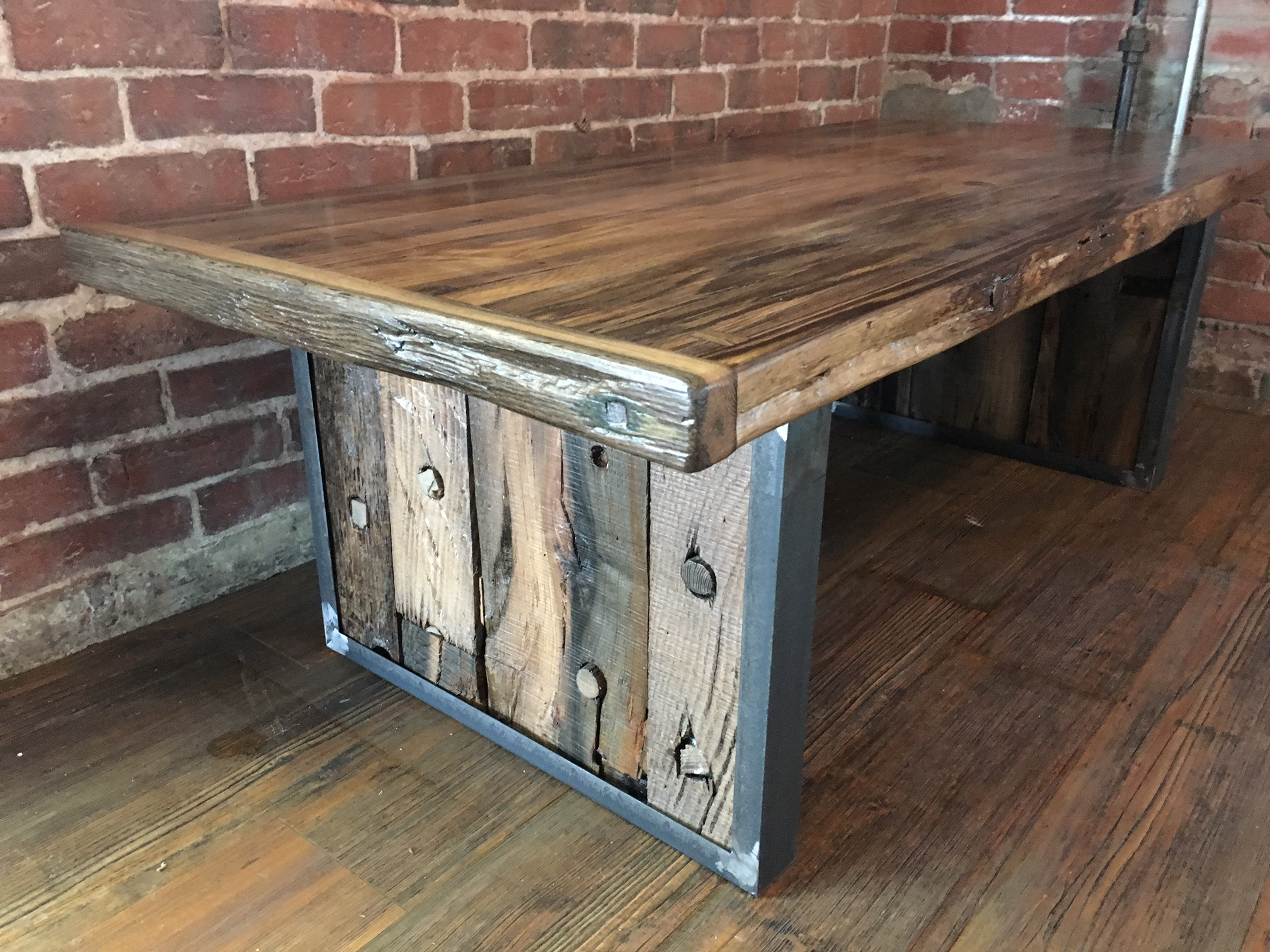 A coffee table made from the ceiling boards of the Seaport shipwreck.