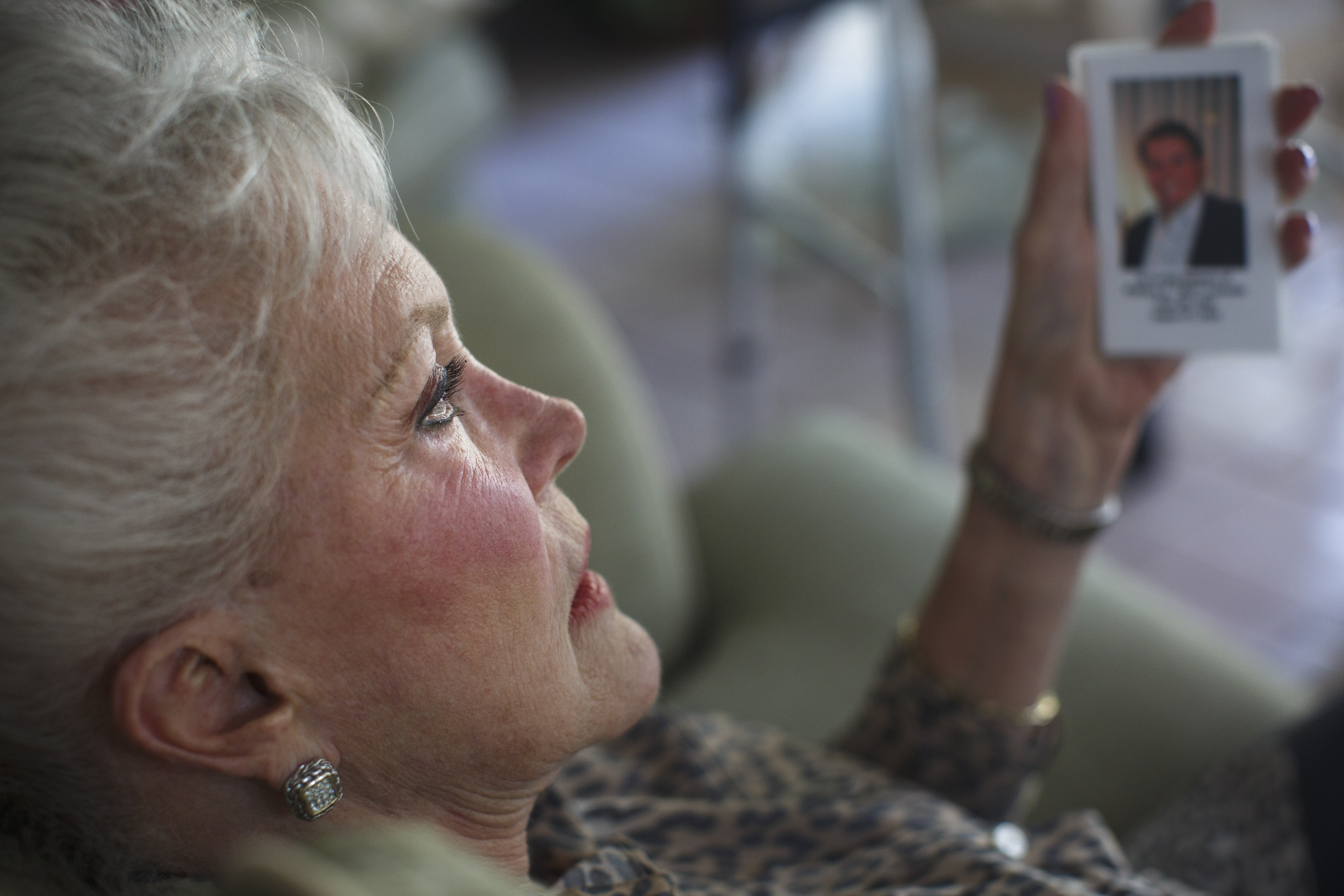Donna Lenkaitis held the card from her husband's funeral.