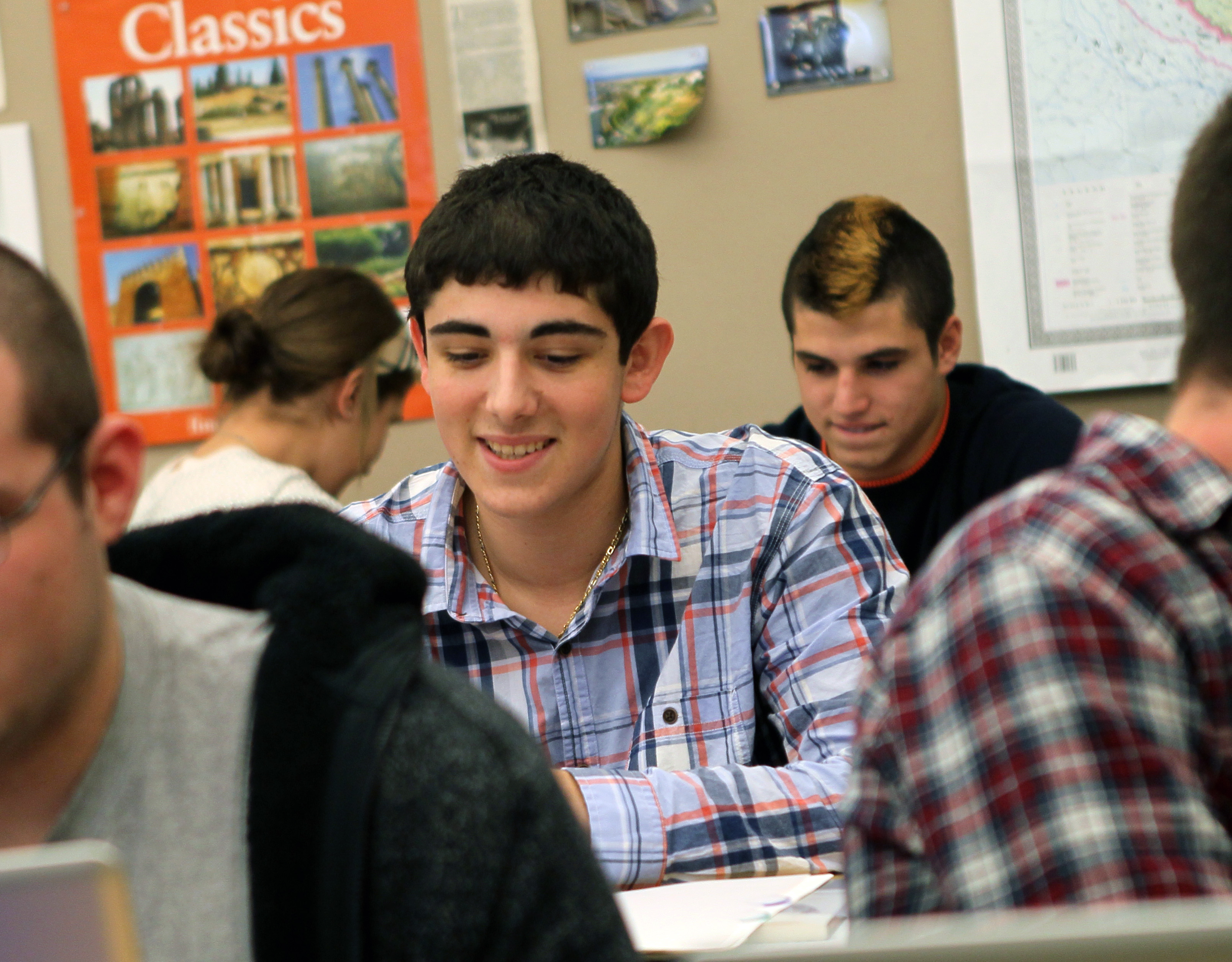 Sam Hornstein in Ted Zarrow’s Latin class at Westwood High School. The class has taken on projects such as translating rap and pop songs into Latin.