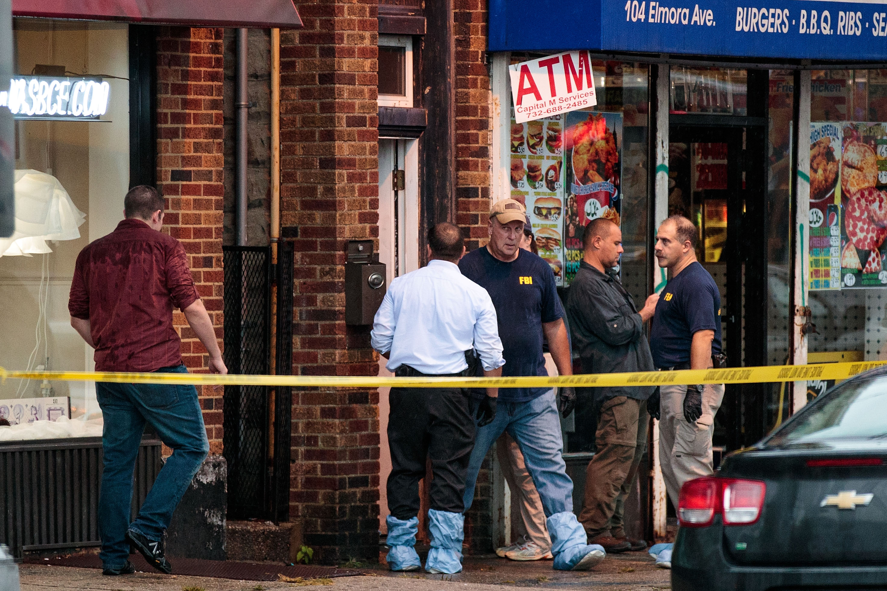 Law enforcement officials raided an Elizabeth, N.J., residence Monday.
