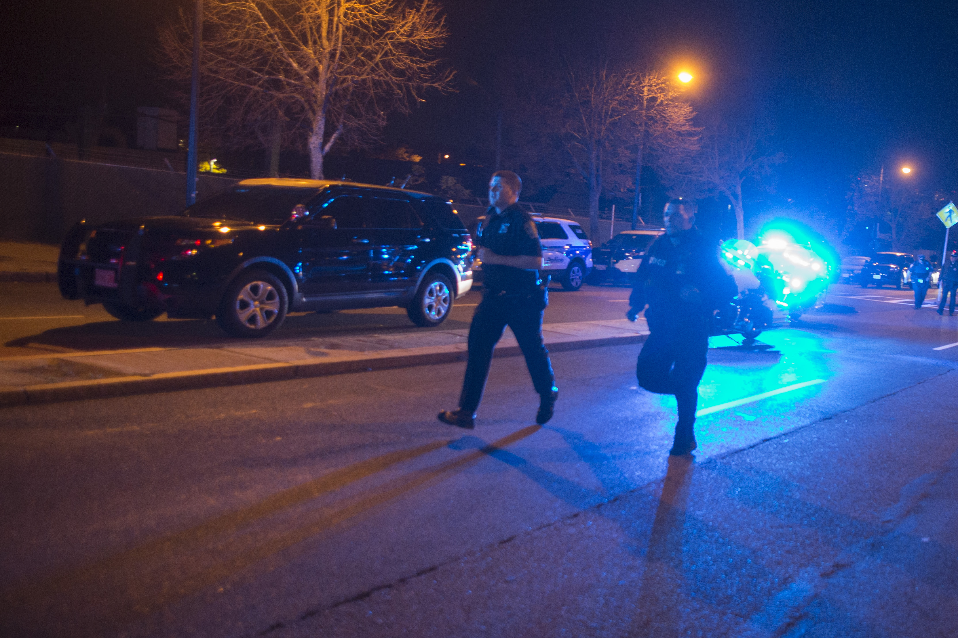 Boston Police officers ran towards he scene where two officers were shot in a firefight leaving a suspect dead in East Boston.