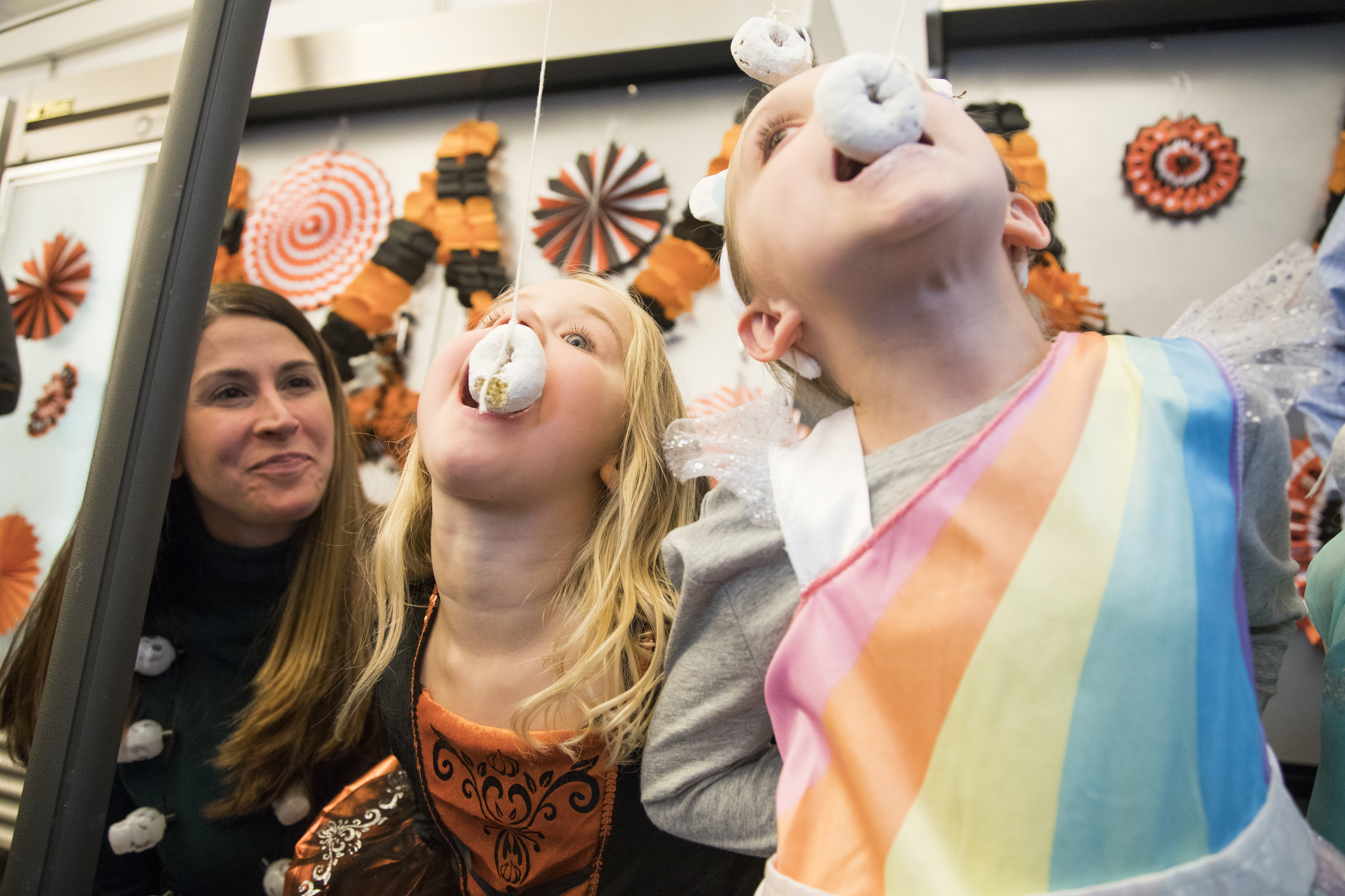 Kari Goodwin with her daughter Cami (middle) and friend Anna at the Halloween party at New England Biolabs.