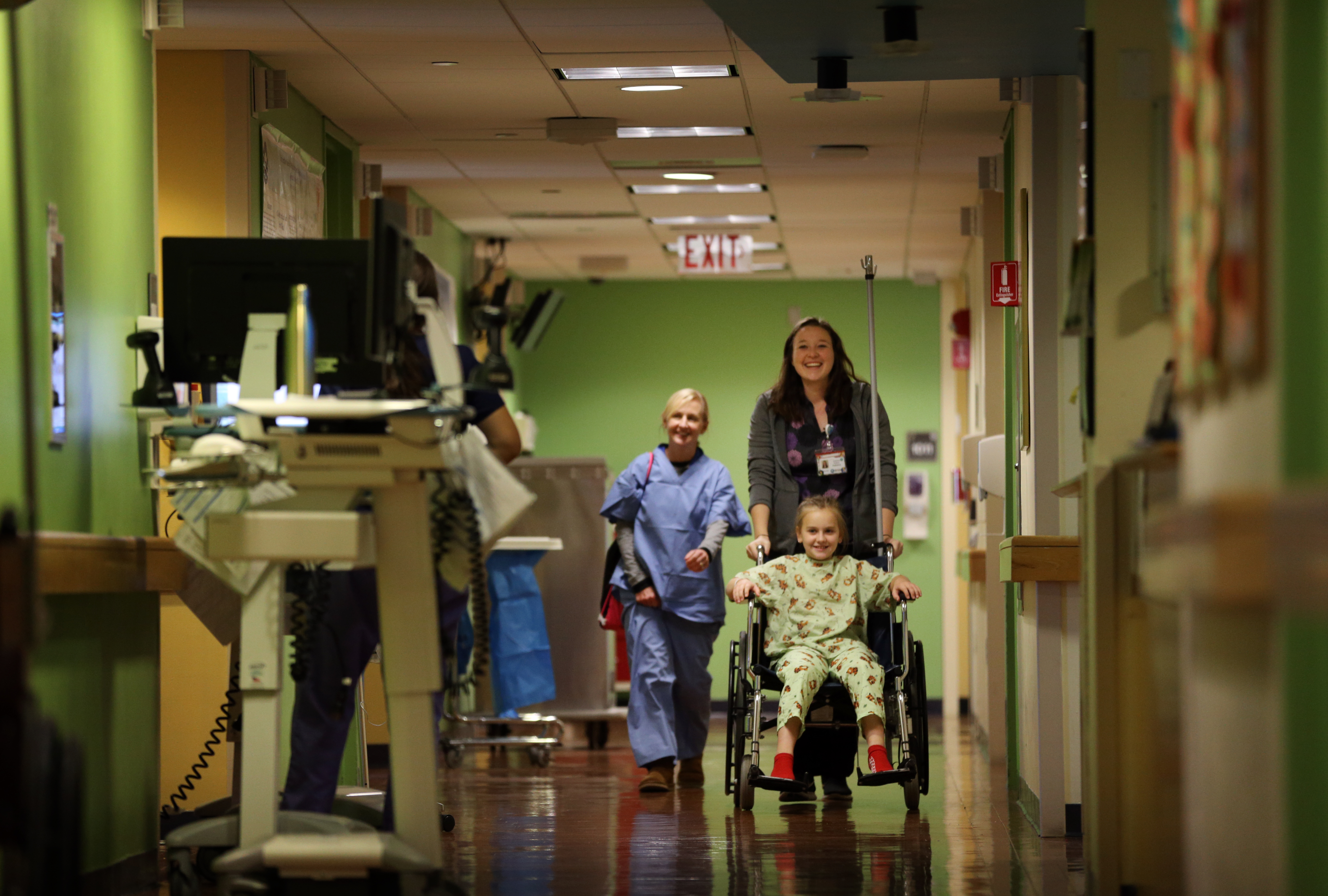 Sheila Quinn (left) followed her daughter Mia Quinn, 11, who was being prepared for an adenoidectomy at Mass. Eye and Ear.