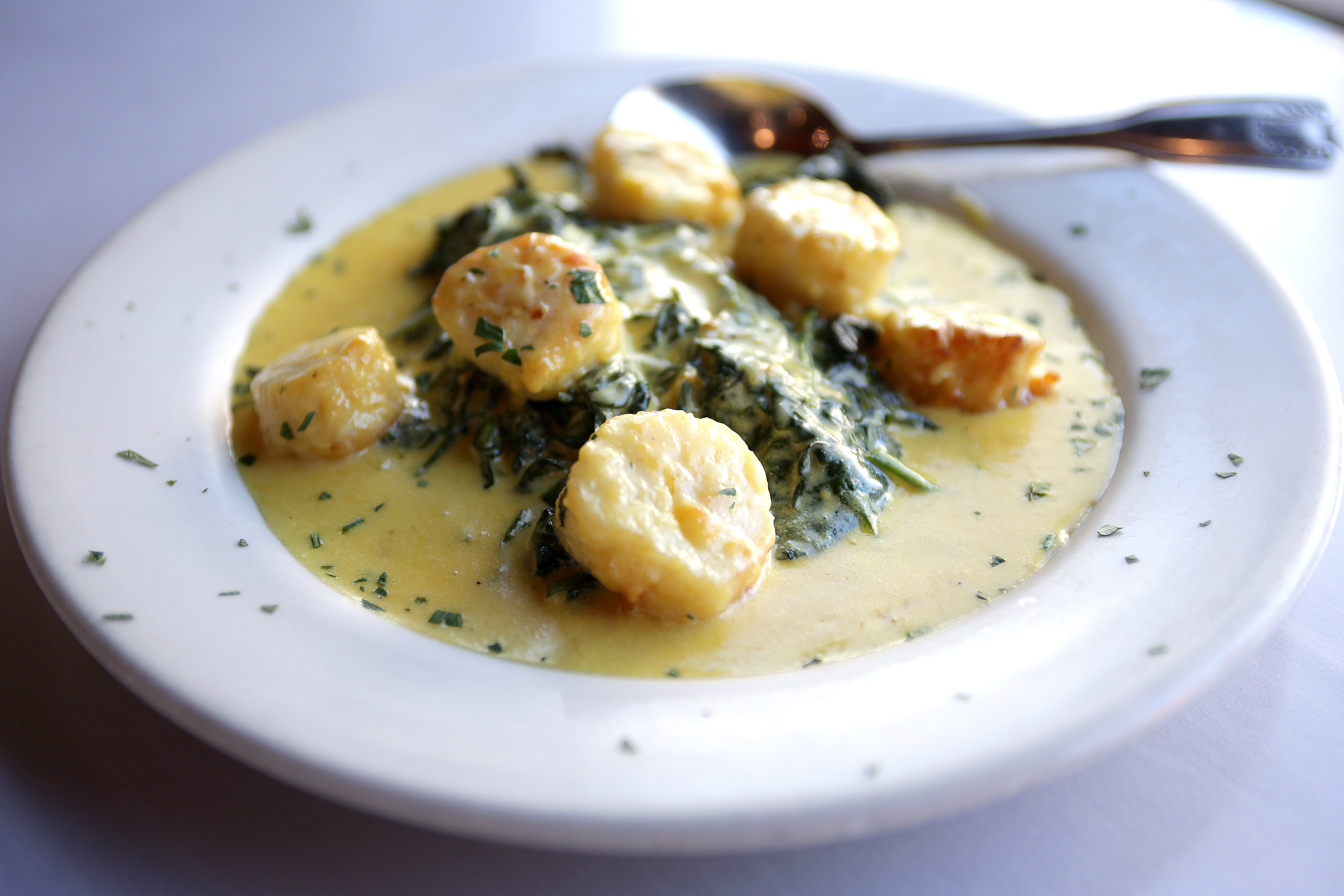 Scallops in limoncello sauce at Rino’s Place.