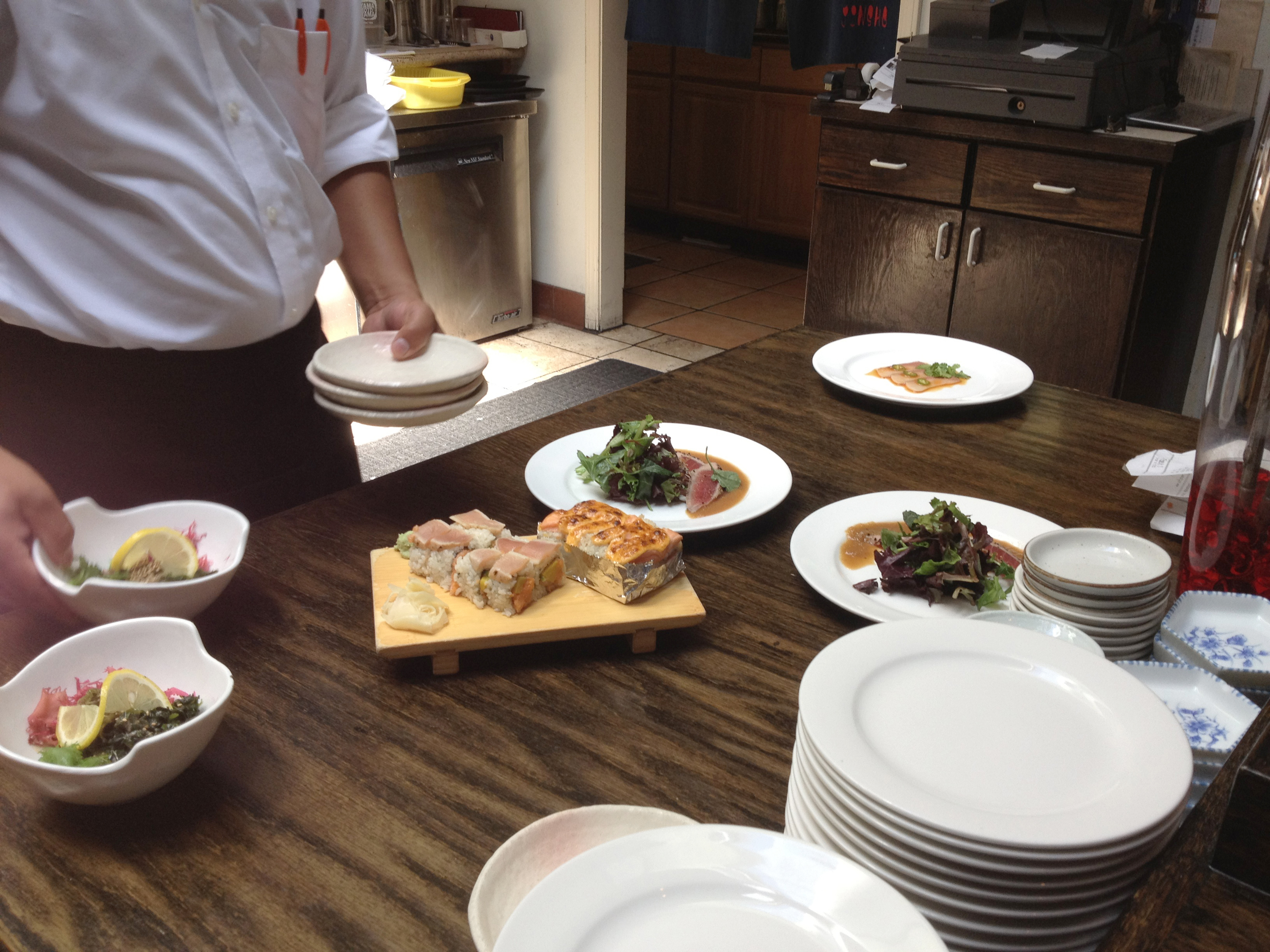 At Jin Sho, Job’s favorite sushi place, items off the extravagant menu all pass onto the table near the kitchen.