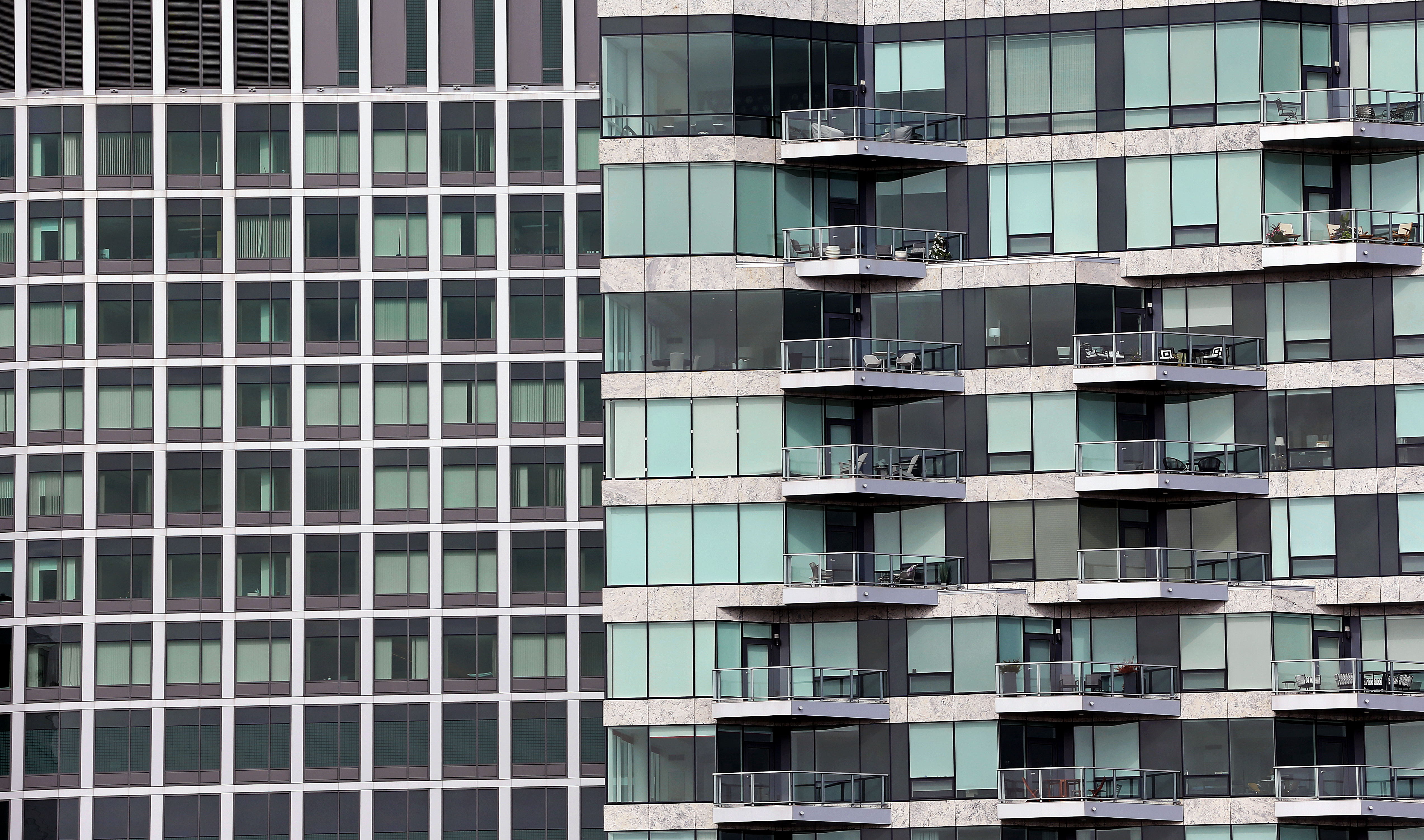 Buildings in the Seaport were constructed so close to each other, they block the water views, such as here with the Vertex Pharmaceuticals building on the left, and 50 Liberty condos by Fan Pier on the right.