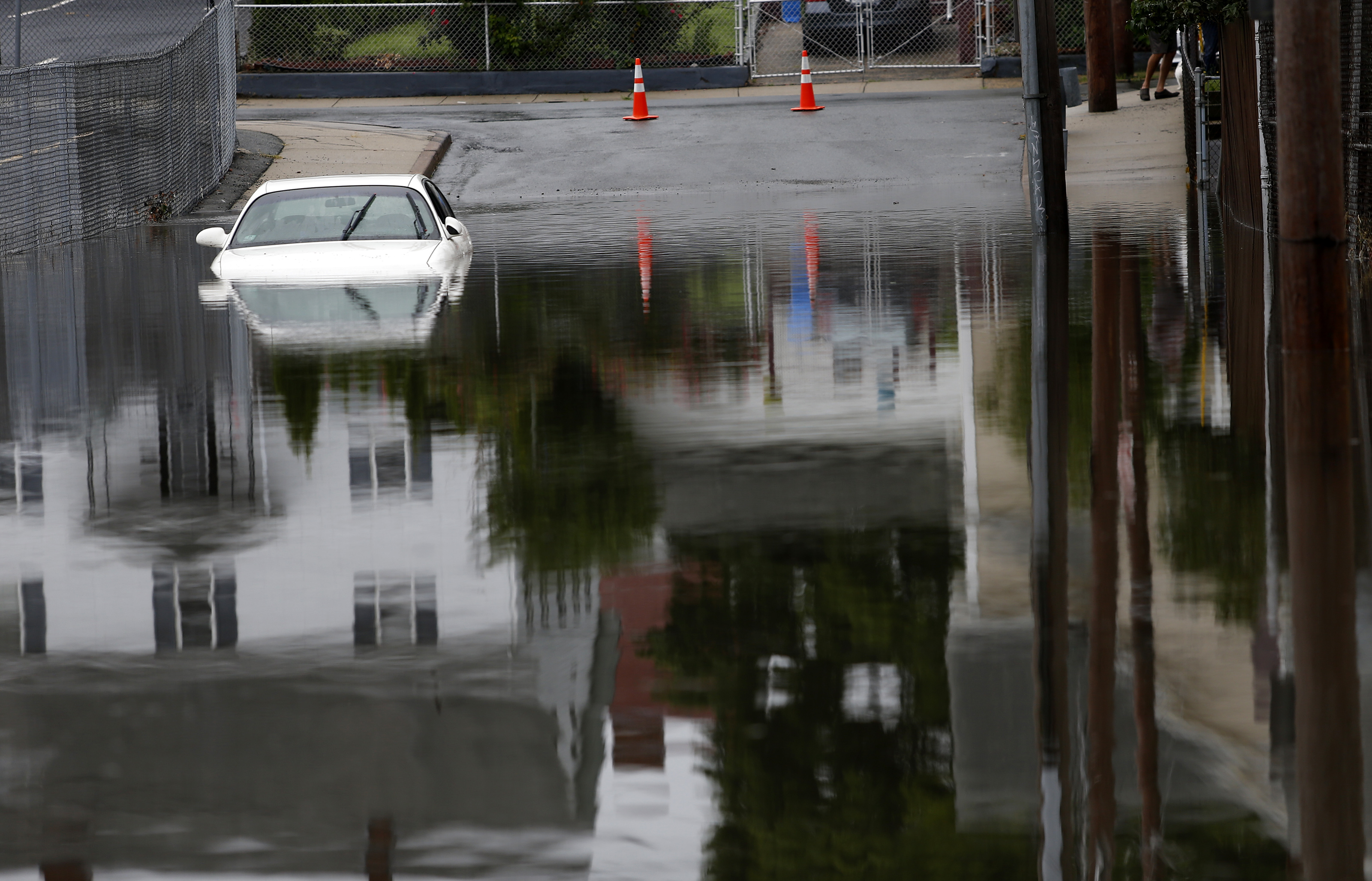 A car on Bridge Street in Lynn was submerged in flood waters.