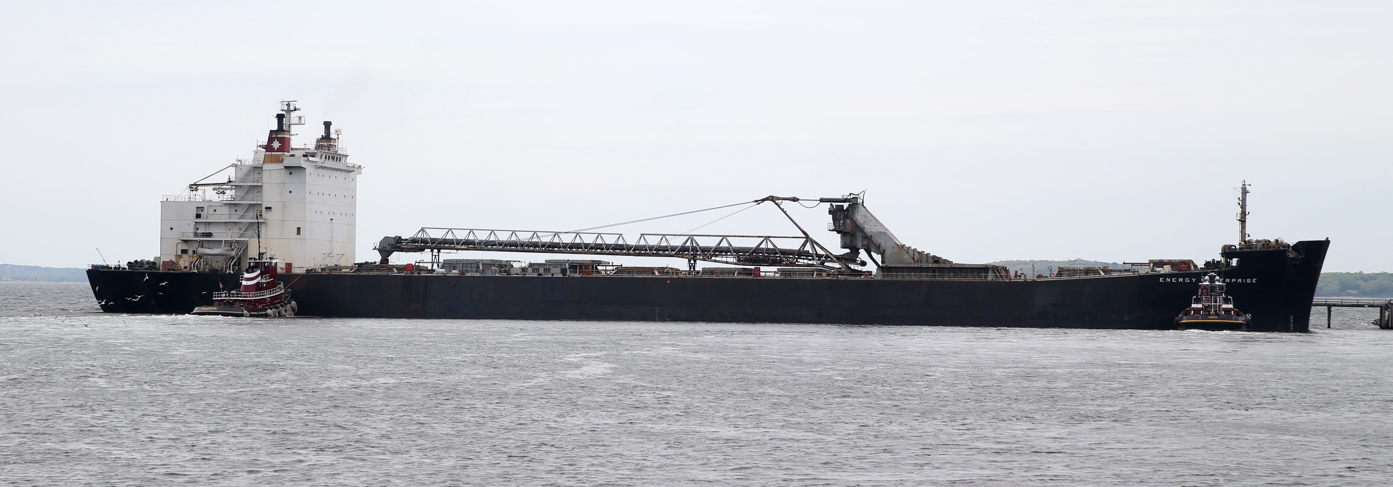 The Energy Enterprise, the coal ship that was blocked by the Henry David T., waited to dock at the Brayton Point Power Station.