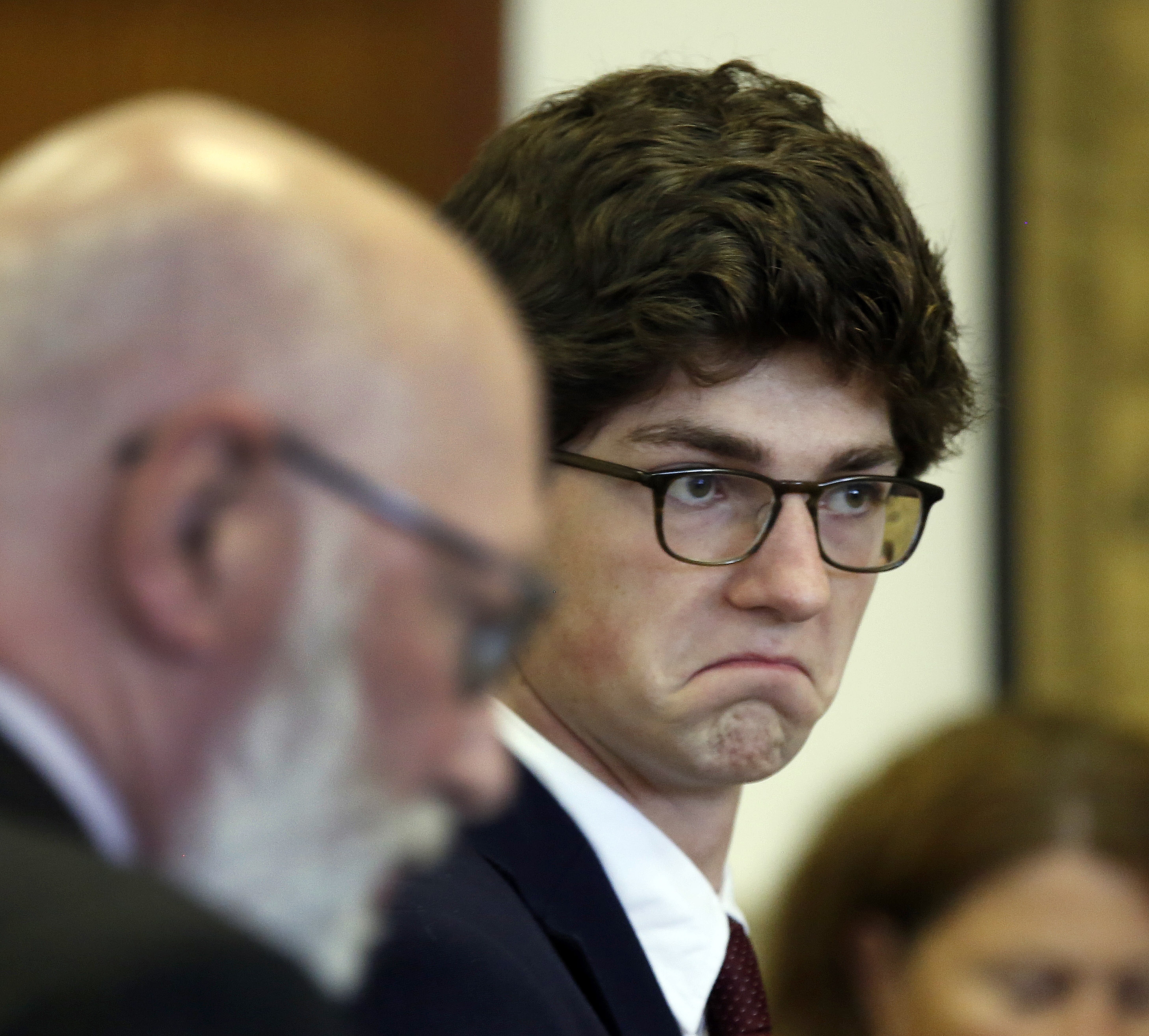 Owen Labrie left court for a lunch break after several of his classmates testified on Monday in Concord, N.H.