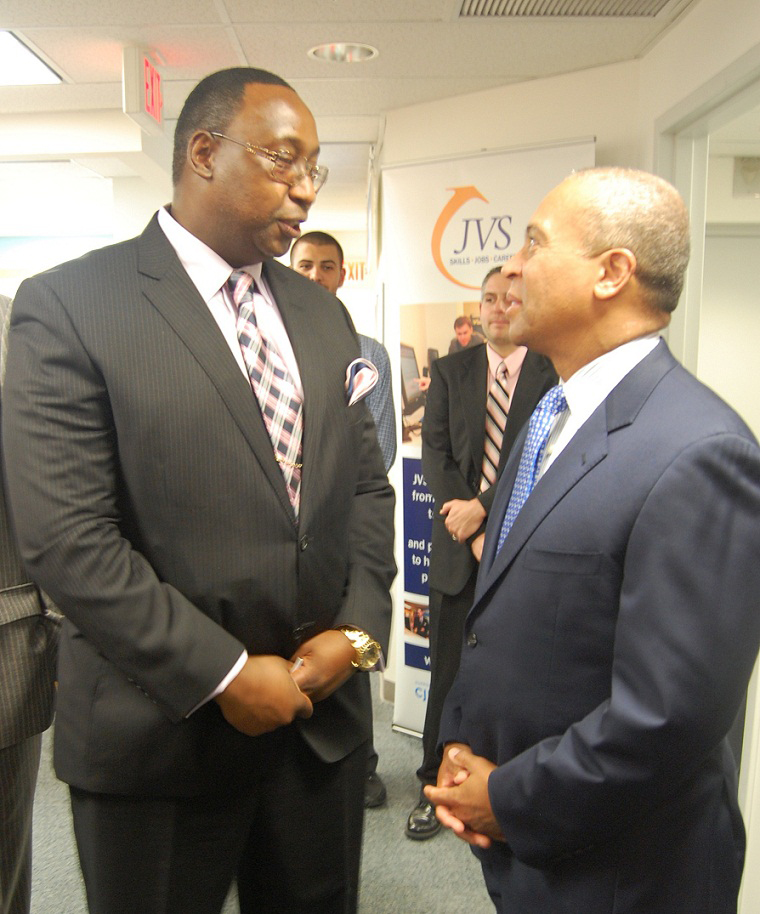 Malden resident Charles Mwangi (left) chats with Governor Deval Patrick during Tuesday’s gathering in Boston.