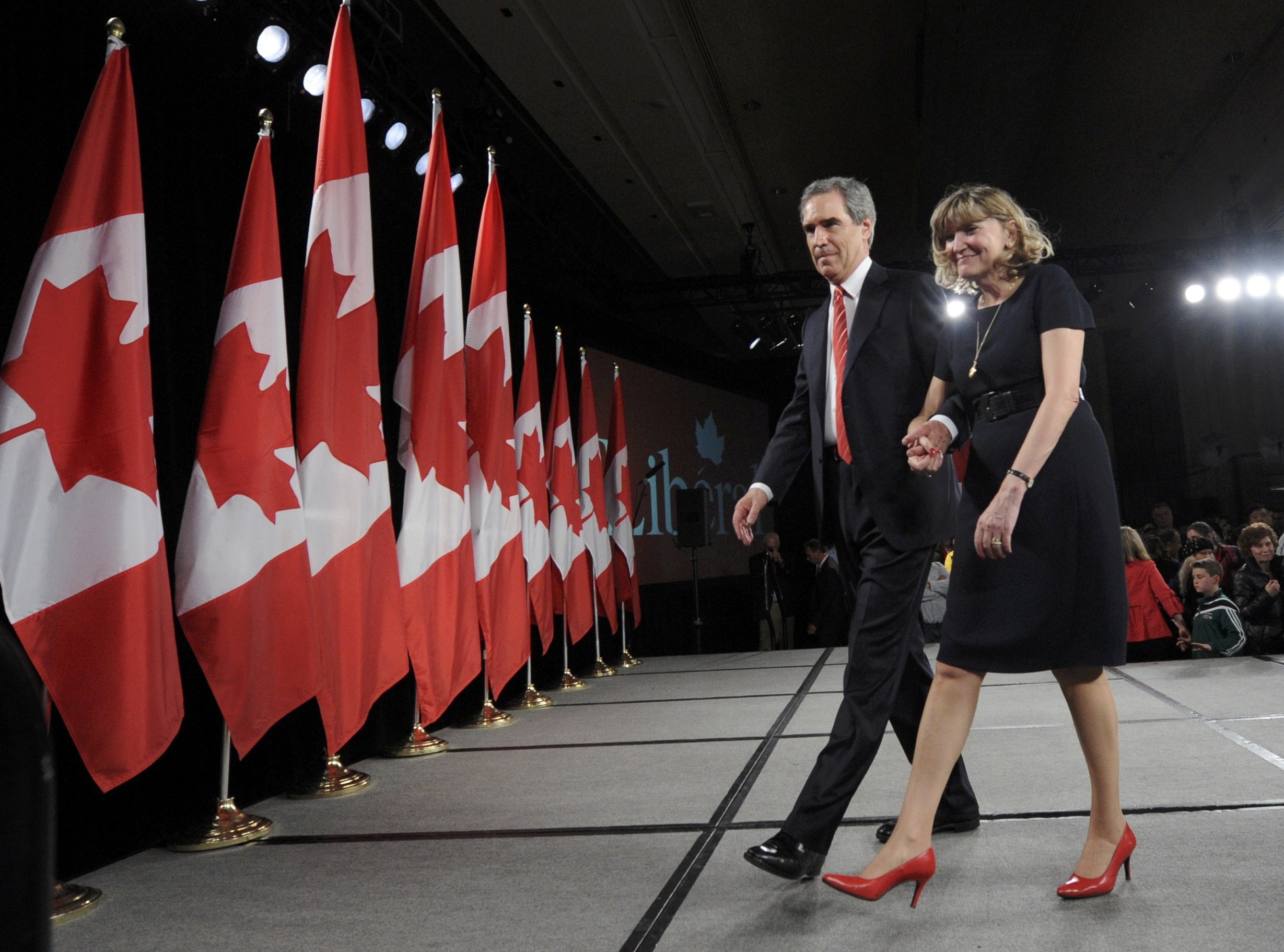 Canada's Liberal leader Michael Ignatieff and his wife Zsuszanna Zsohar left the stage after addressing supporters following his defeat.
