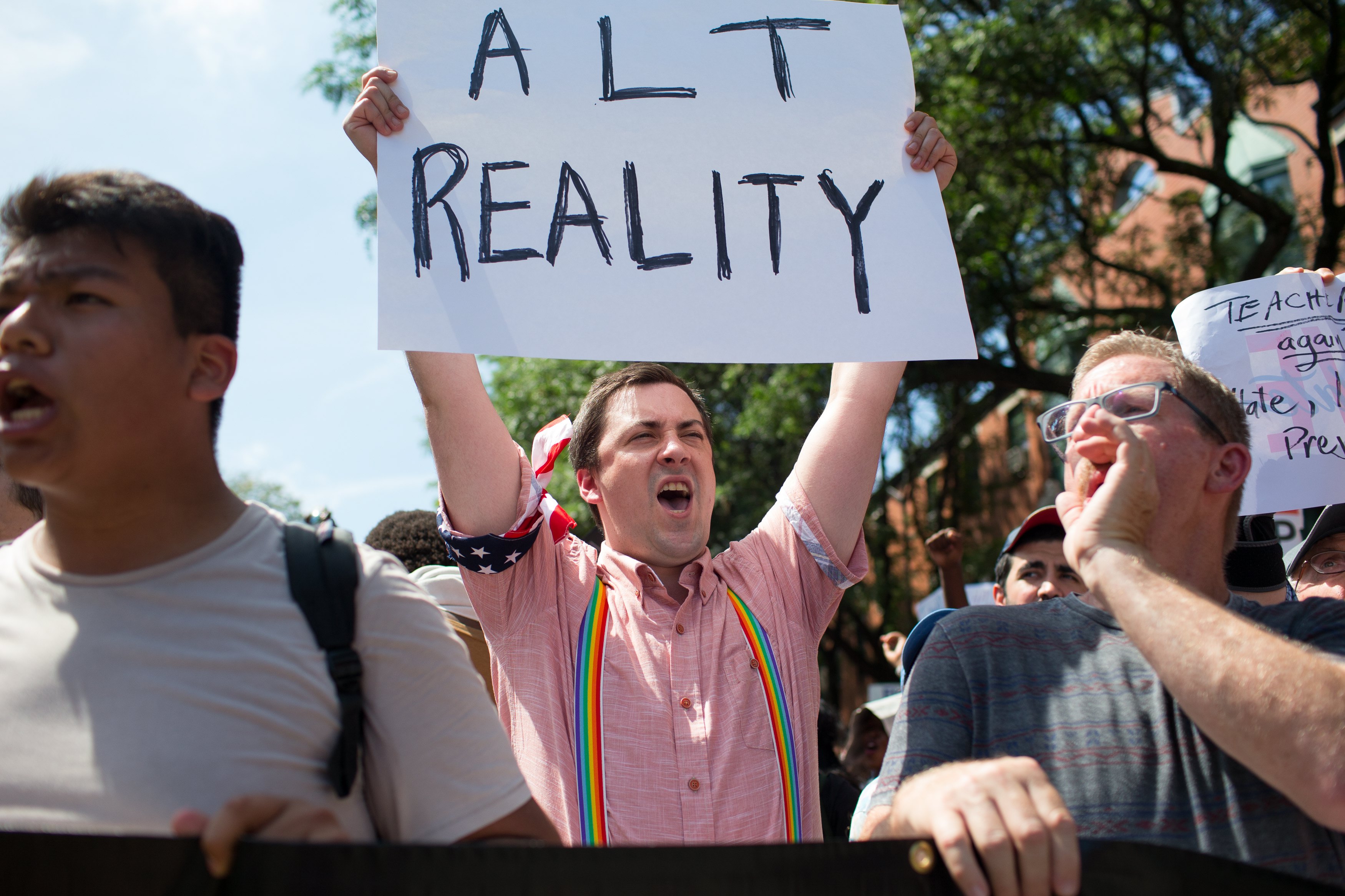 A counterprotester held up a sign on Tremont Street.