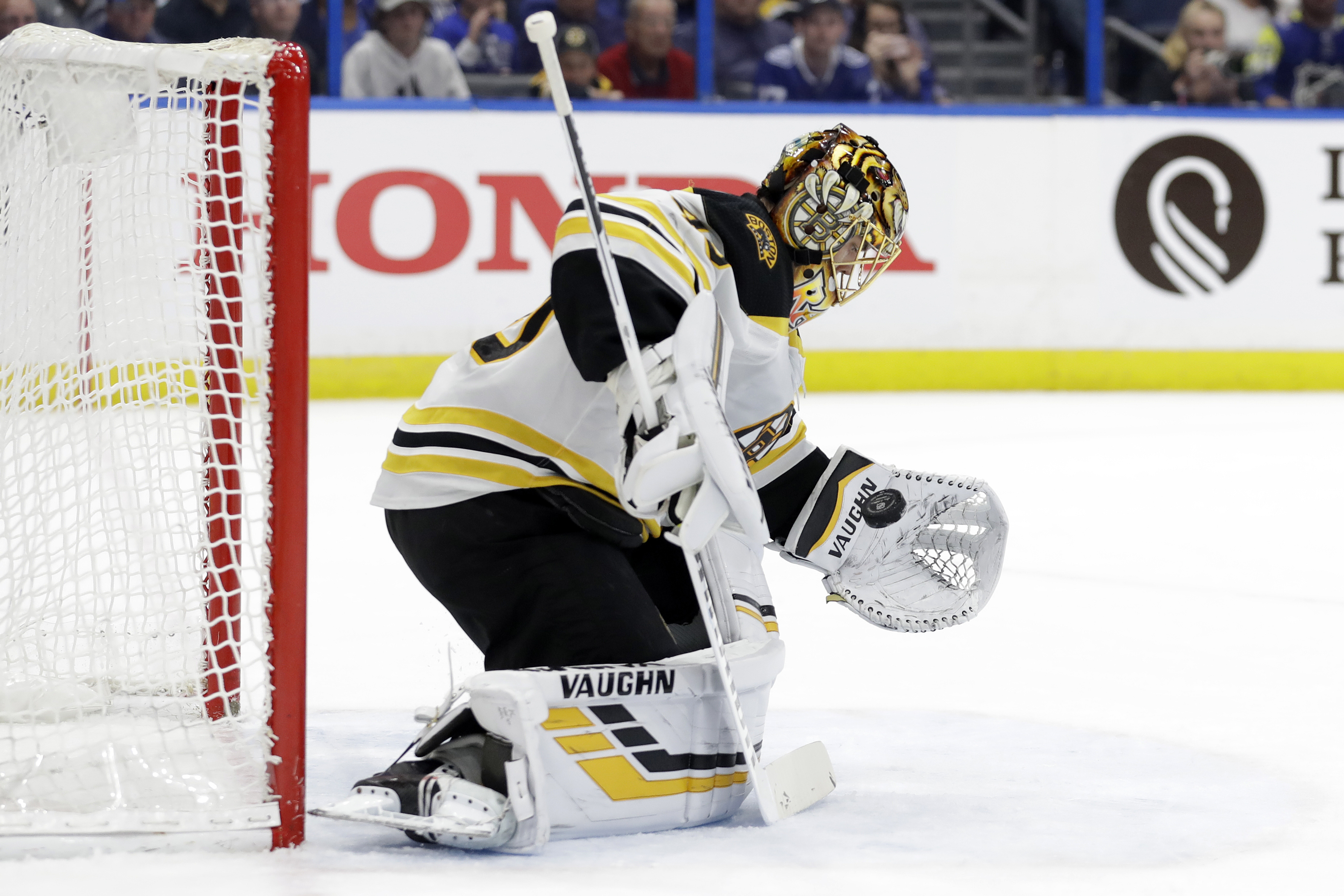 Tuukka Rask makes a glove save in the second period of Tuesday’s game.