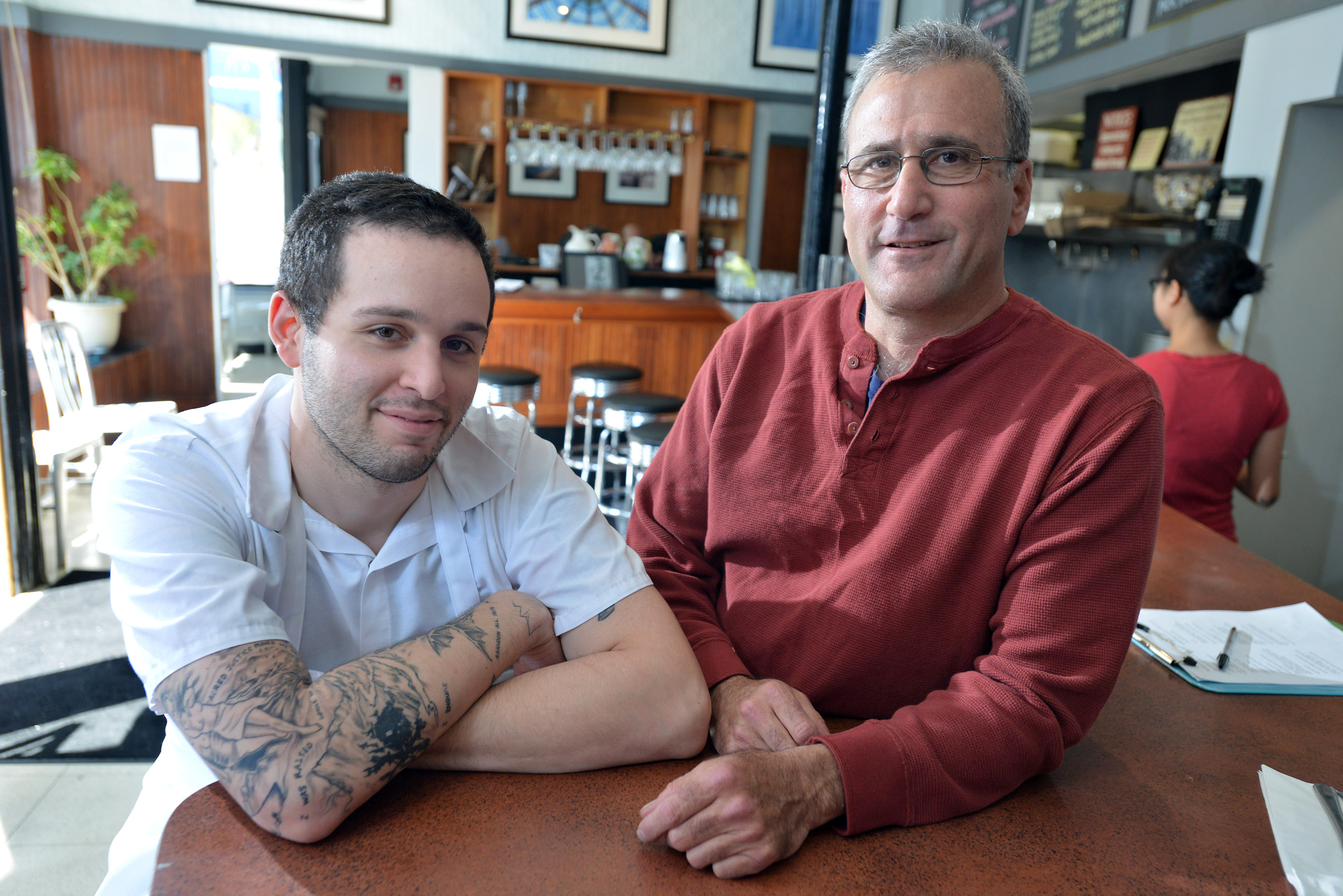 Tim Maslow (left) with his father, Paul Maslow, at Strip T's in Watertown.