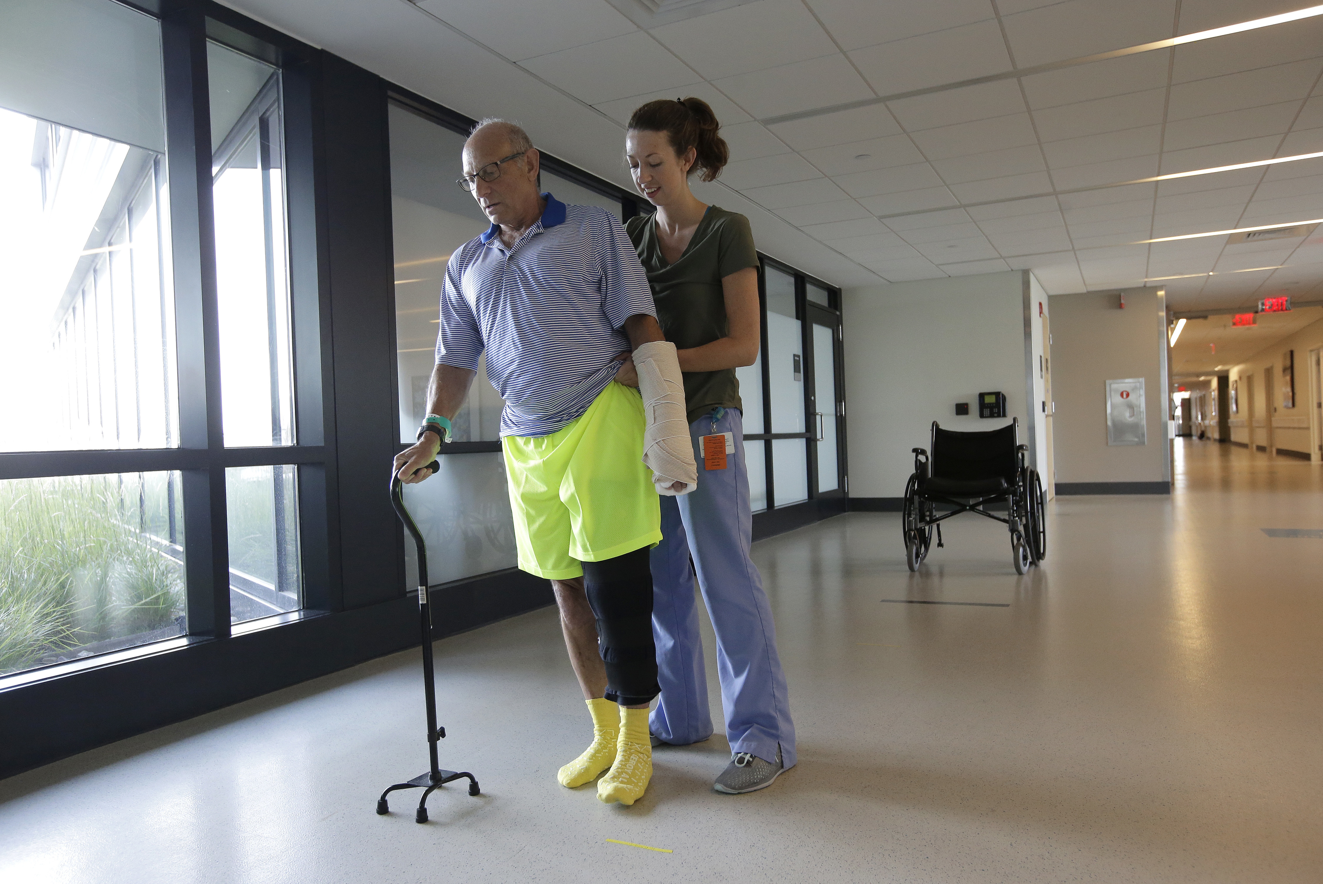 Lytton worked with physical therapist Caitlin Geary Tuesday at Spaulding Rehab.