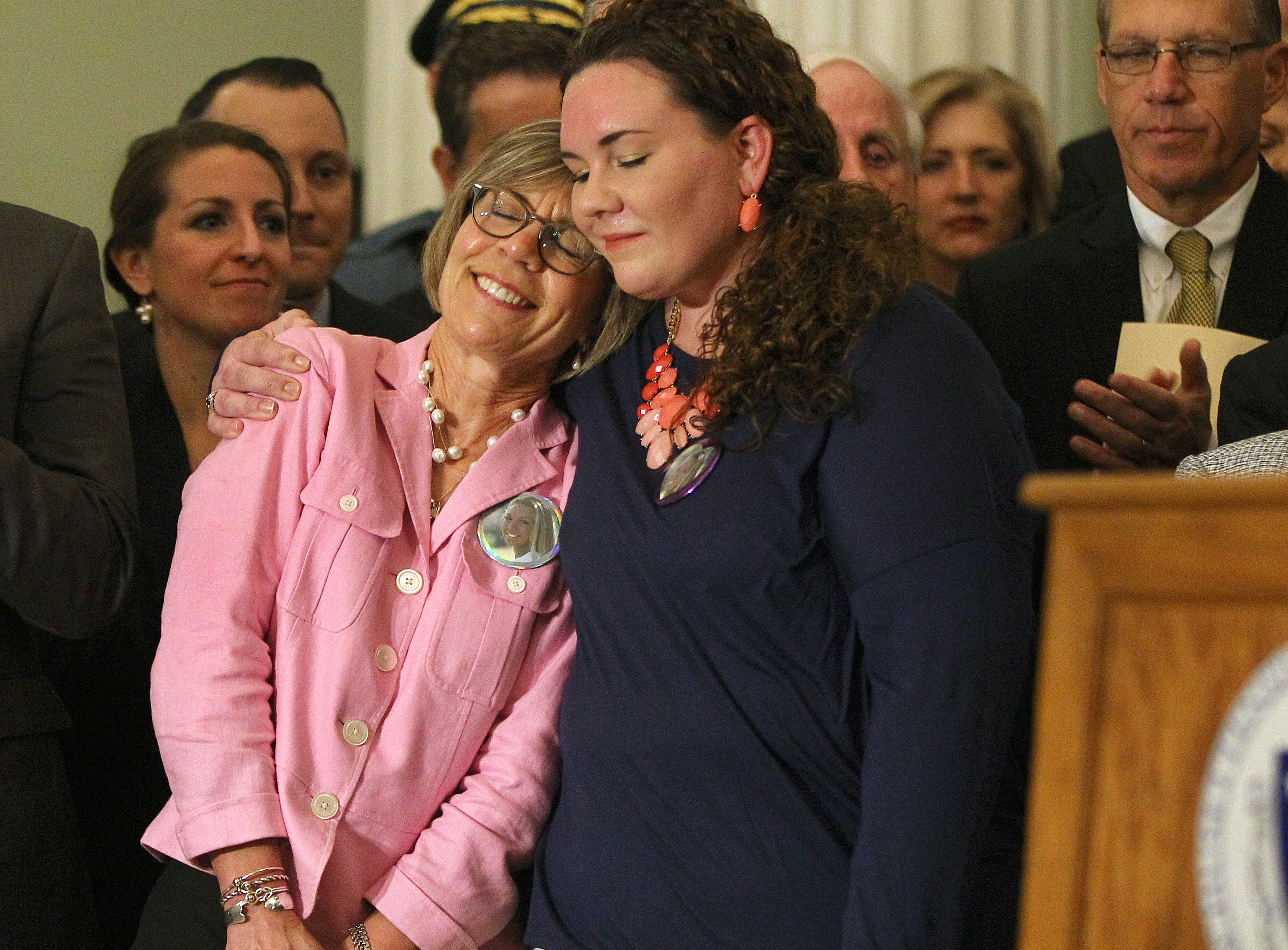 Janis McGrory got a hug from her daughter, Amy LeFort. McGrory’s daughter, Liz, died of an overdose.