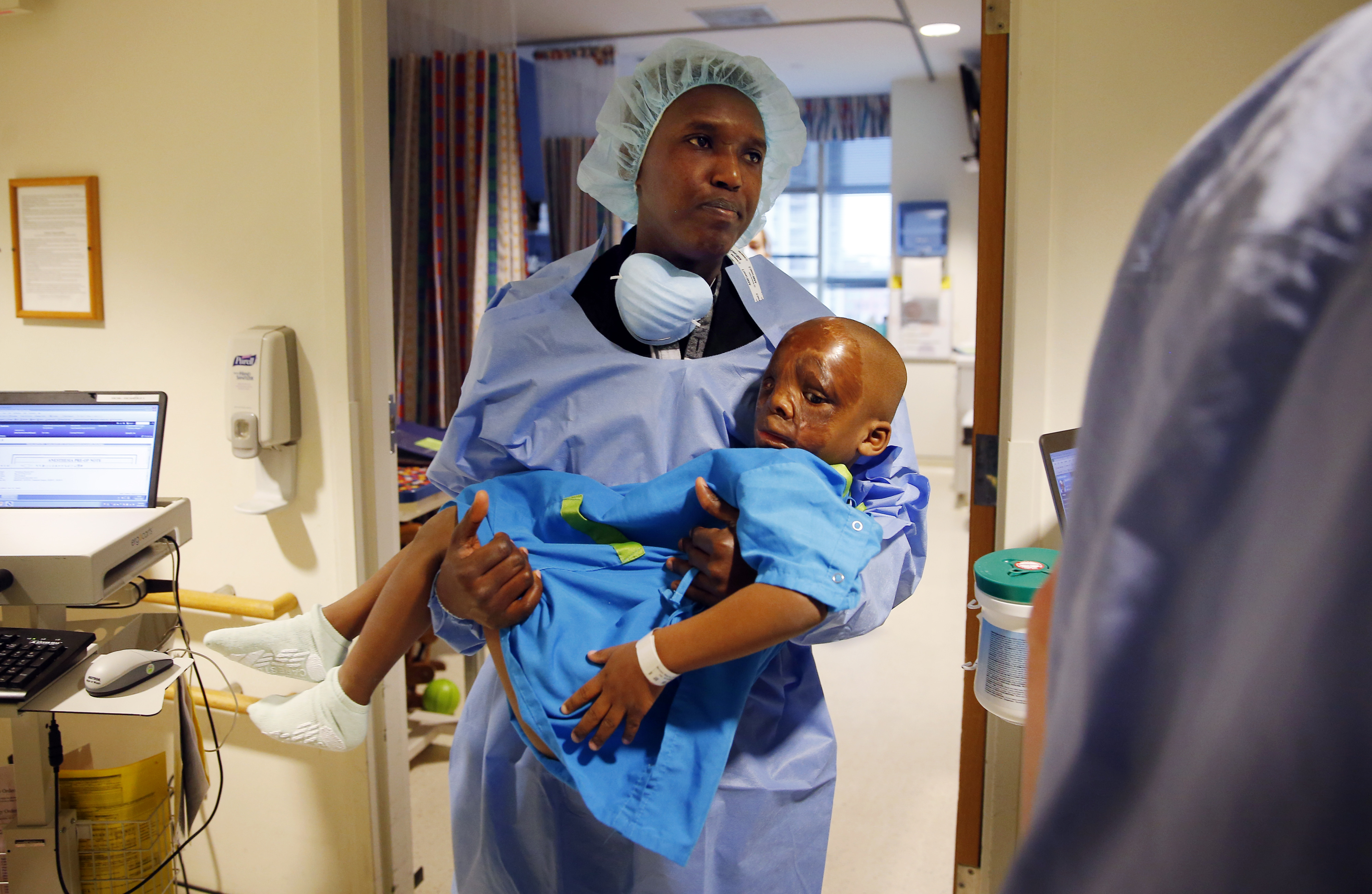 Alex carried Leo into the operating room before his April 21 surgery at Shriners.