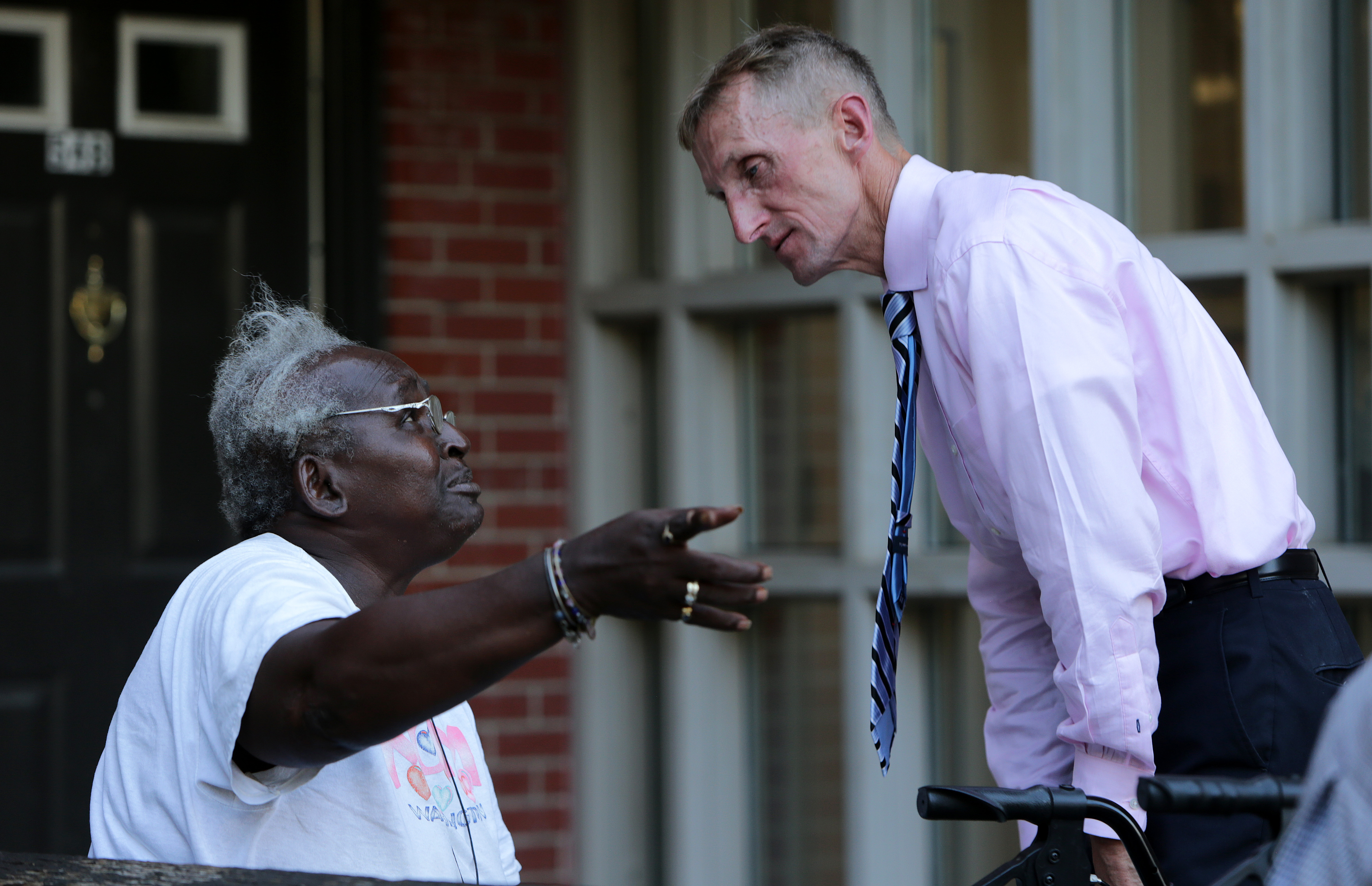 Police Commissioner William Evans listened to the concerns of Virginia Hemingway.