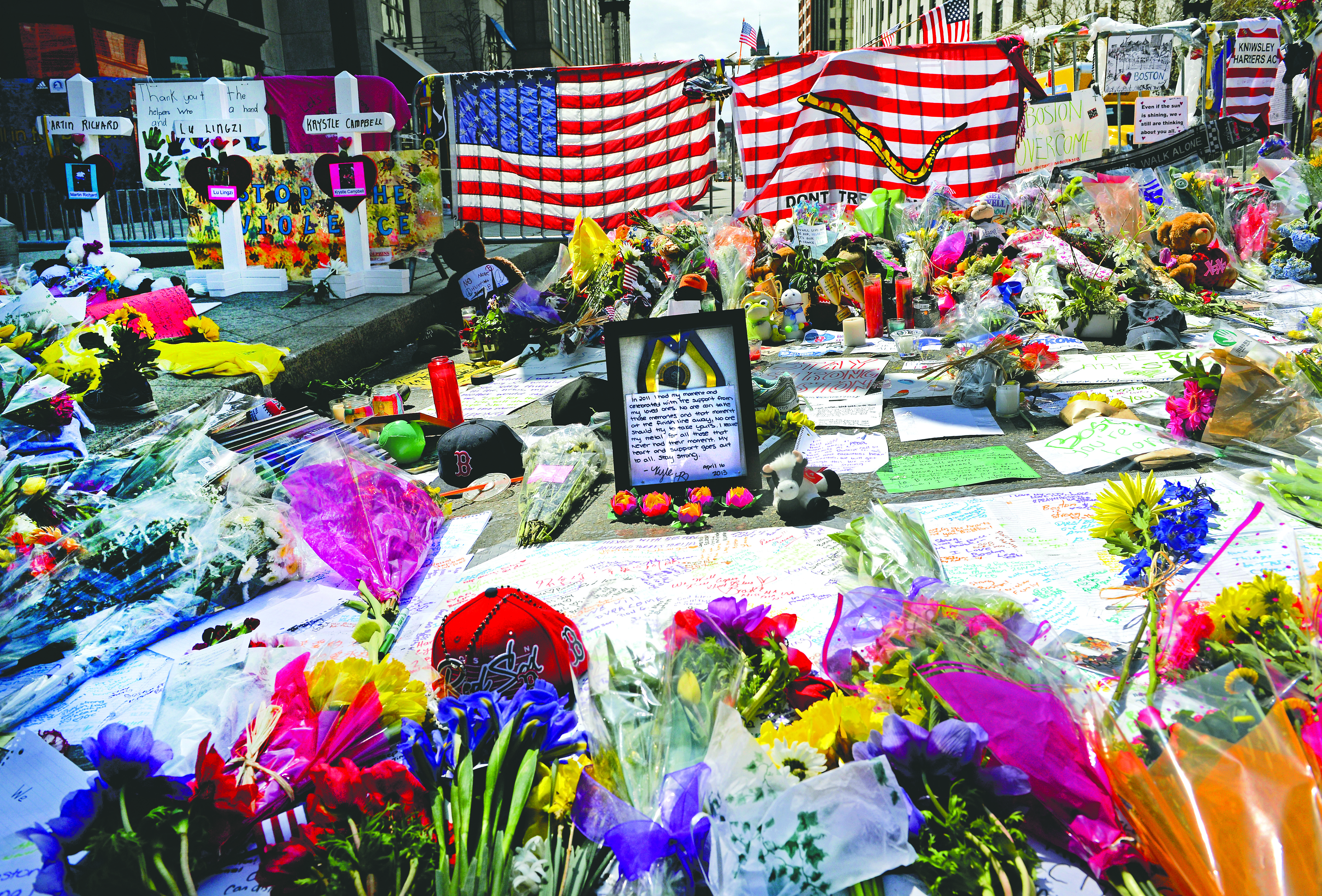 Flowers, medals, stuffed animals, written cards, and more were left at the Marathon finish line in the weeks after the attack. They have been boxed up and sit in storage.