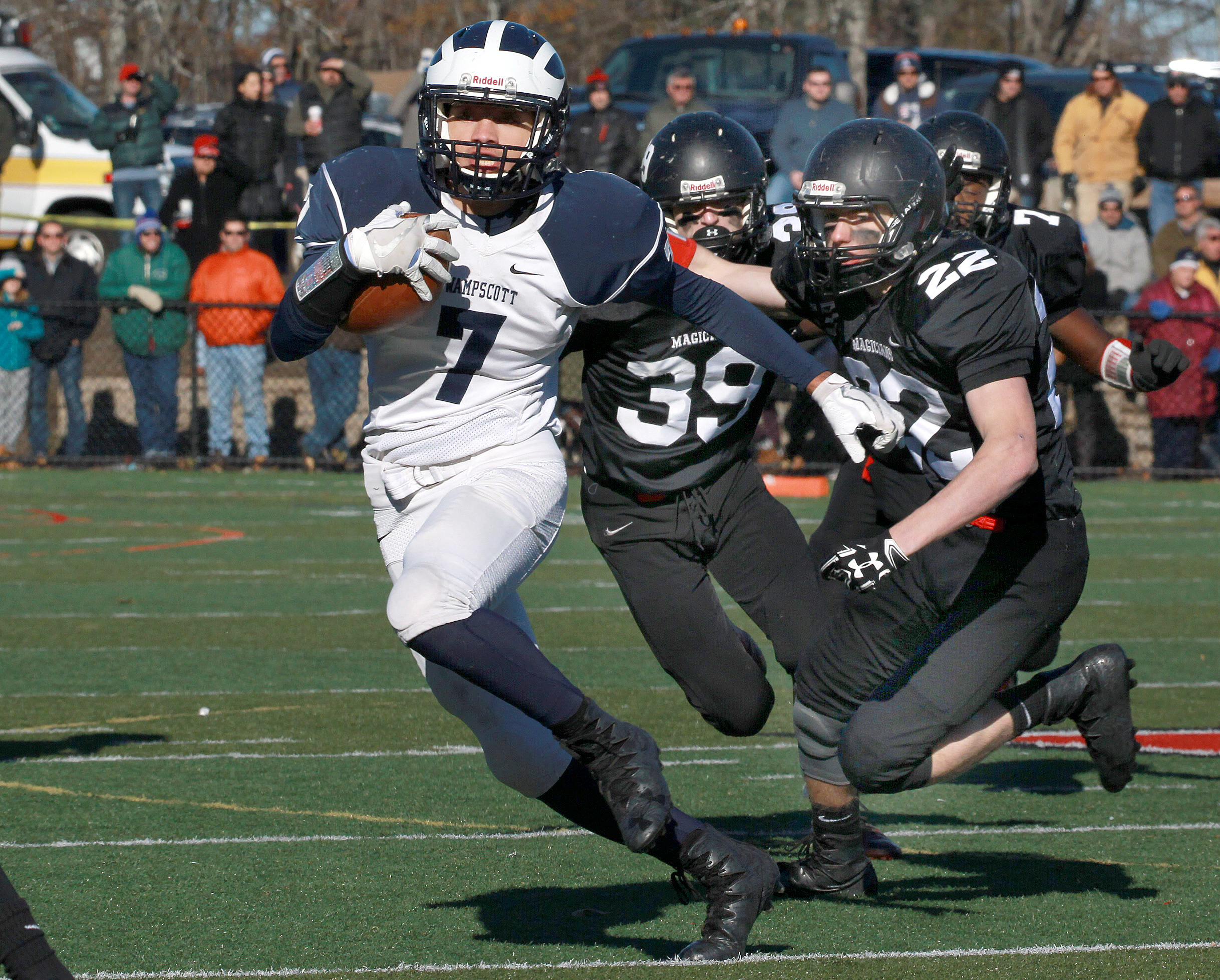 Swampscott's Isaiah Bascon (7) led the way on this rush in the first quarter.