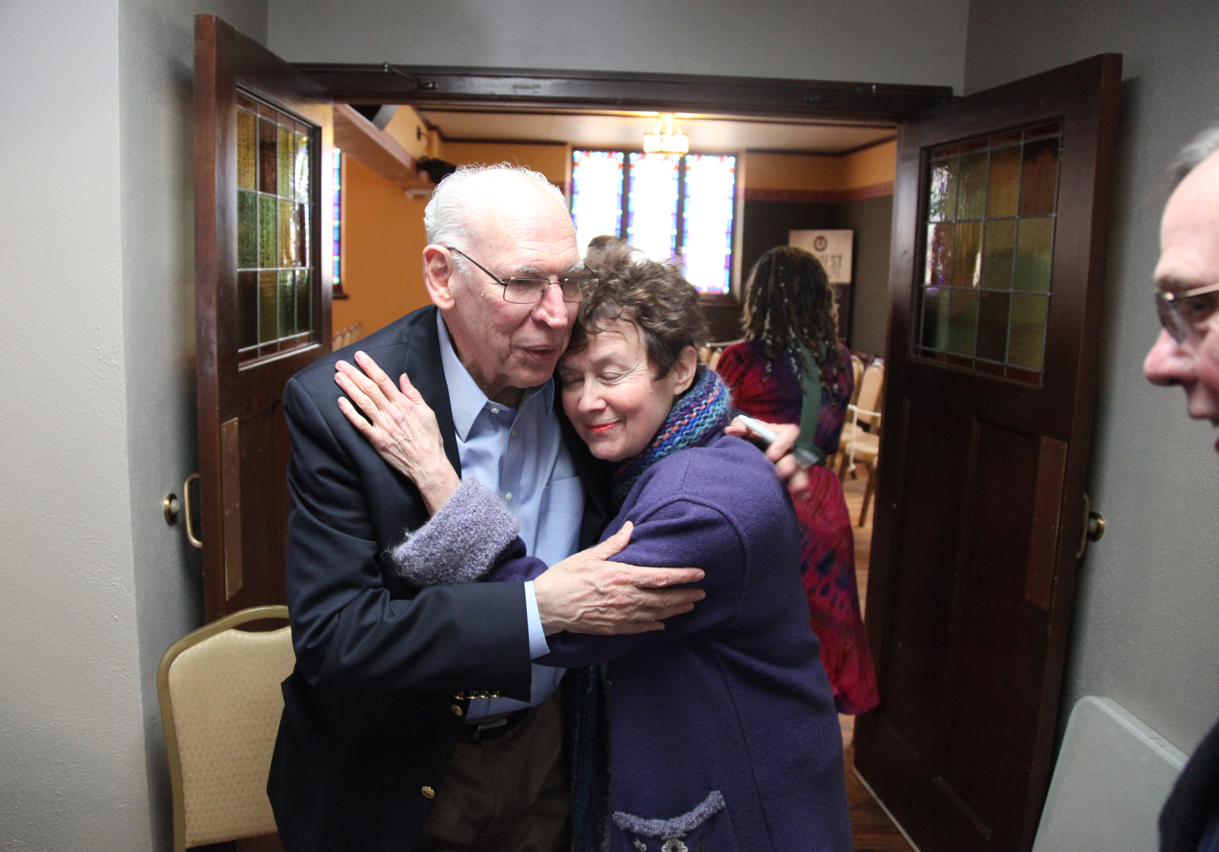 Rafael Cruz got a hug from Cheryl Kutscher, of West Des Moines, at his book signing at Harvest Bible Chapel in Grimes, Iowa, on Saturday.