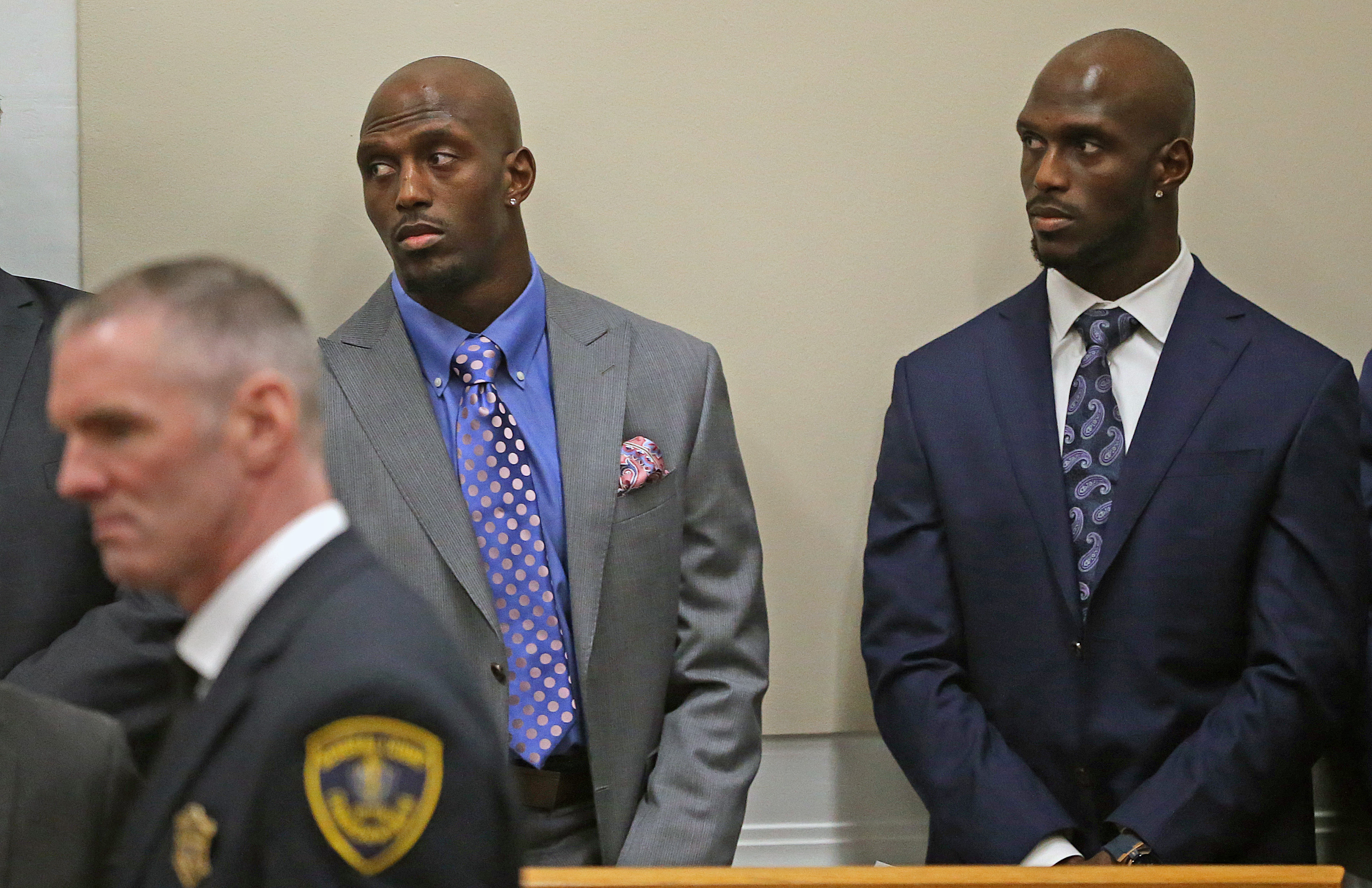 New England Patriots players Devin and Jason McCourty appeared at the State House to express their support of the PROMISE act, a proposal that would overhaul of public school funding.