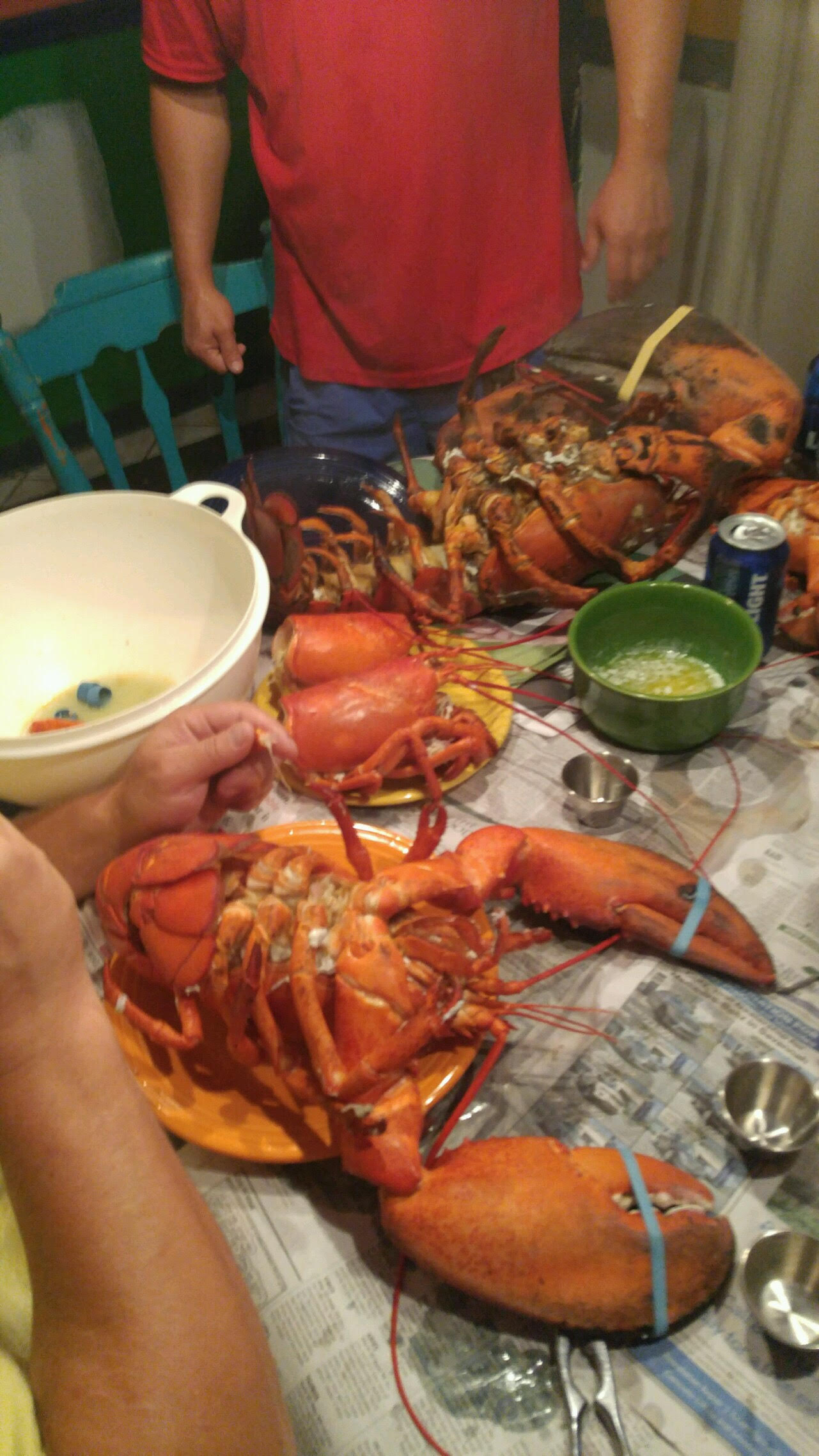 After photos of 15-pound lobster went viral, Christopher Stracuzza served it up for a feast with friends.