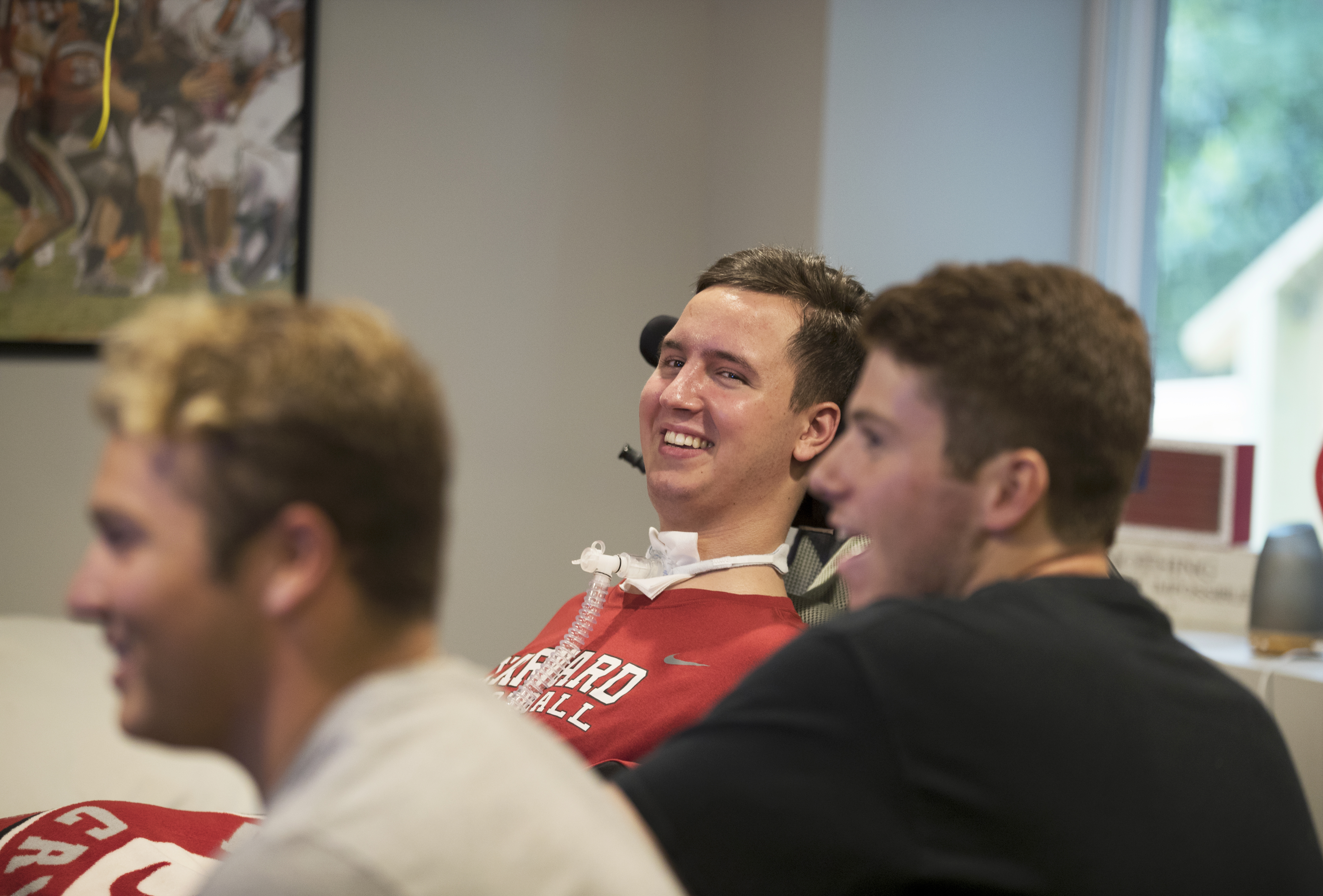 Ben laughs it up with Hoover High School buddies while they watch the Red Sox game.
