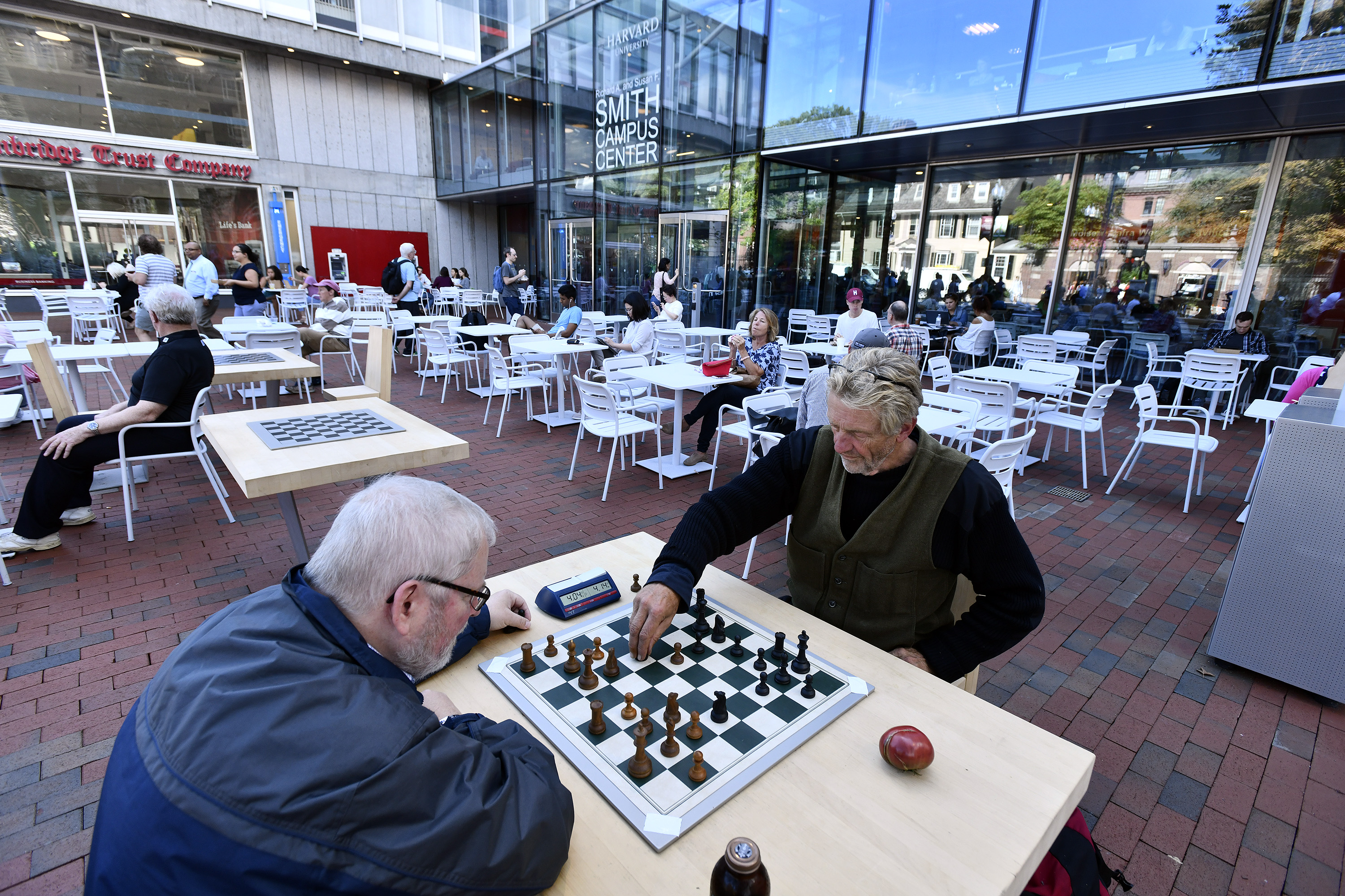 Chess players, a fixture in front of the old Holyoke Center, have returned to the plaza now that the transformed complex has reopened as the Smith Campus Center.