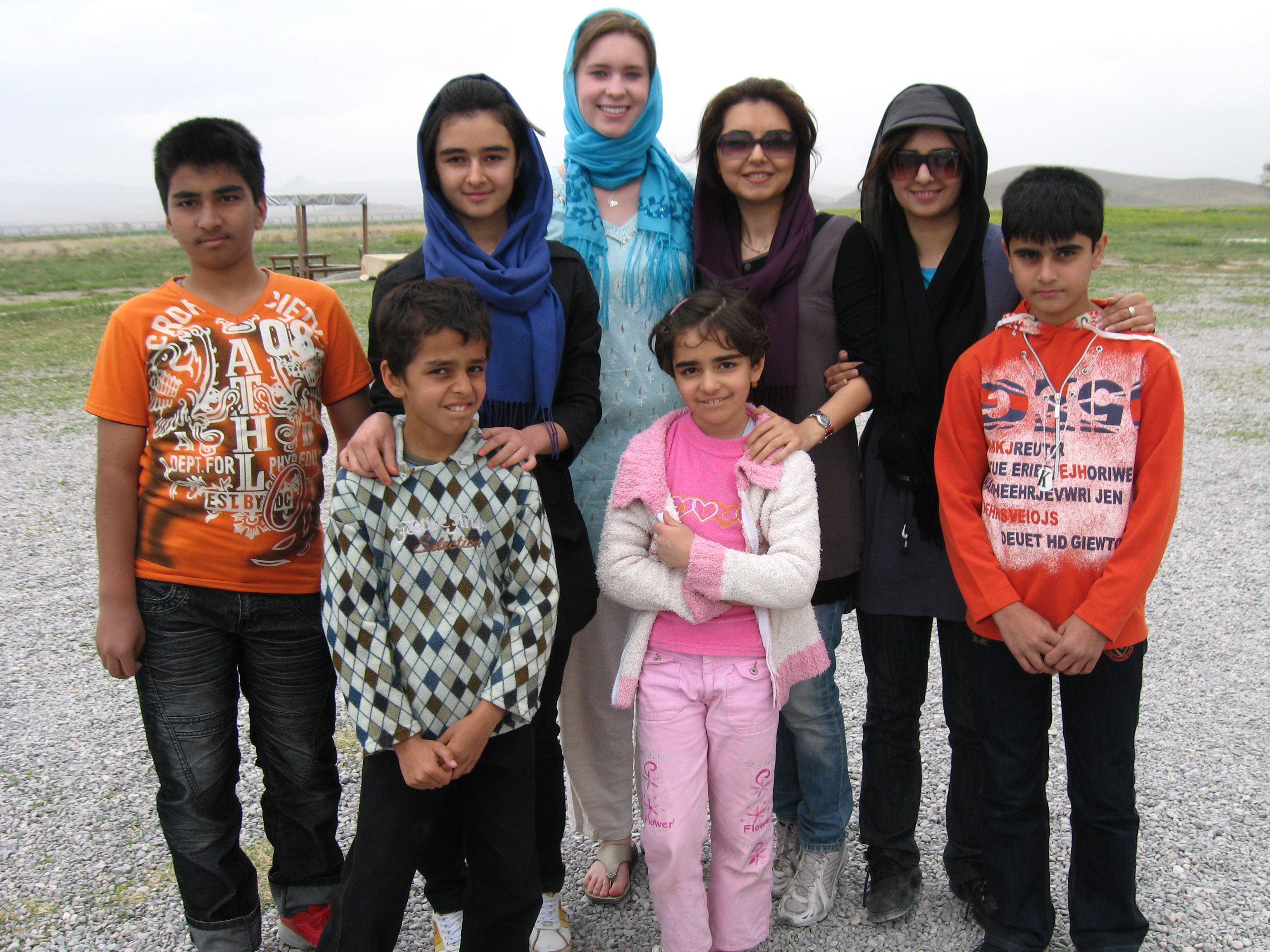Brooke Loughrin (pictured in 2010 with an Iranian family) has lived in Iran and studied for a semester in India.
