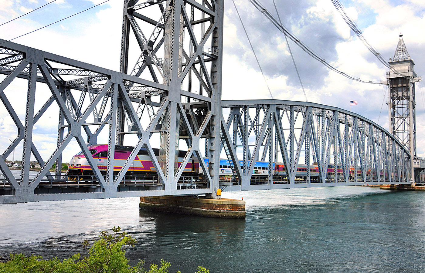 Bourne 05/18/2013: The CapeFLYER train crosses over the Cape Cod Canal Railroad Bridge in Bourne on route to Hyannis. The CapeFyer, a train from South Station, made a trial run from South Station to the Transportation Center in Hyannis. Photo by Debee Tlumacki for the Boston Globe (metro) Reporter: Martine Powers