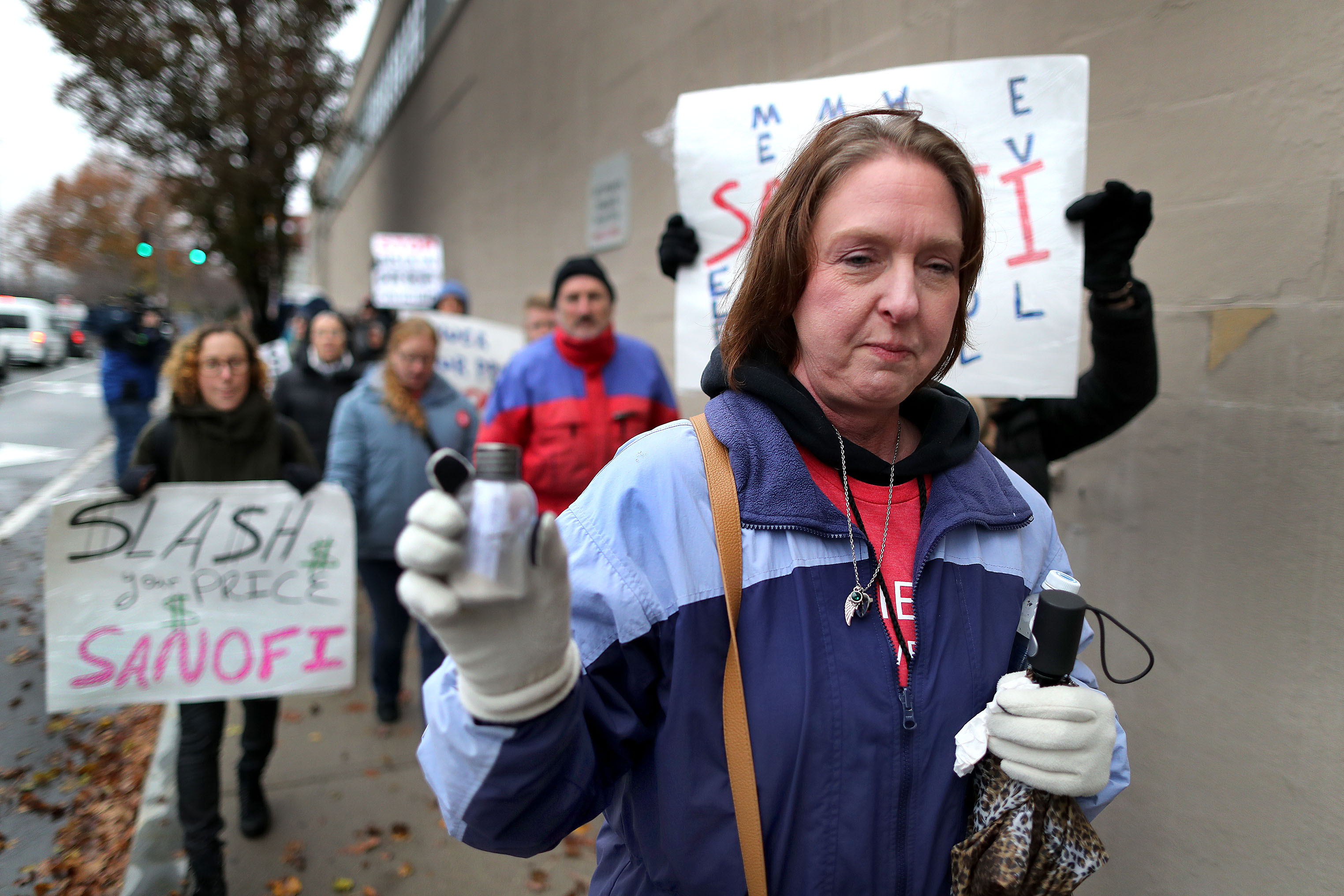 Nicole Smith-Holt of Richfield, Minn., held a vial with the ashes of her son, Alec, who died at the age of 26 from insulin rationing.