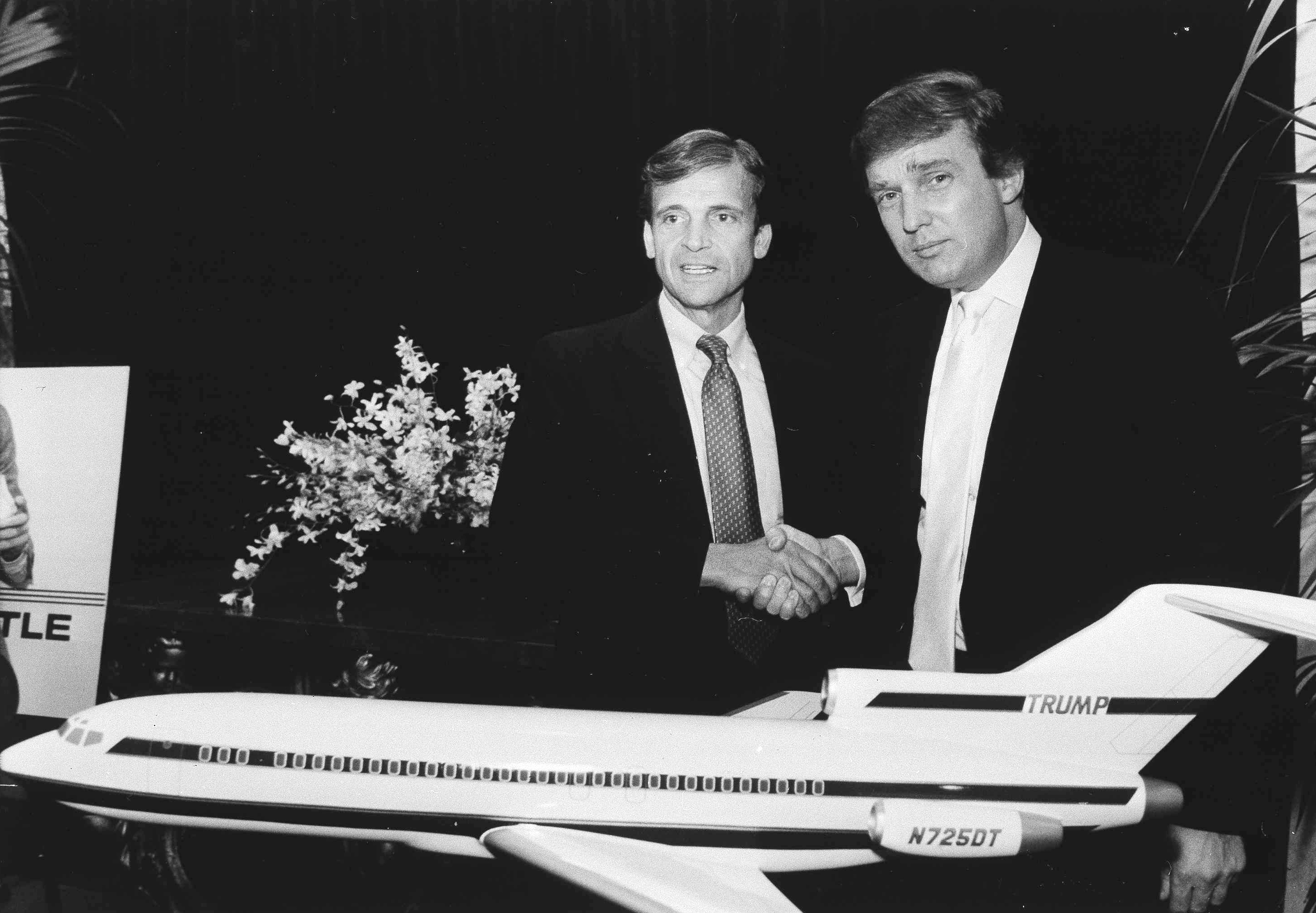 Donald Trump shook hands with Frank Lorenzo, from whom he bought Eastern Airlines’ profitable Northeast air shuttle.