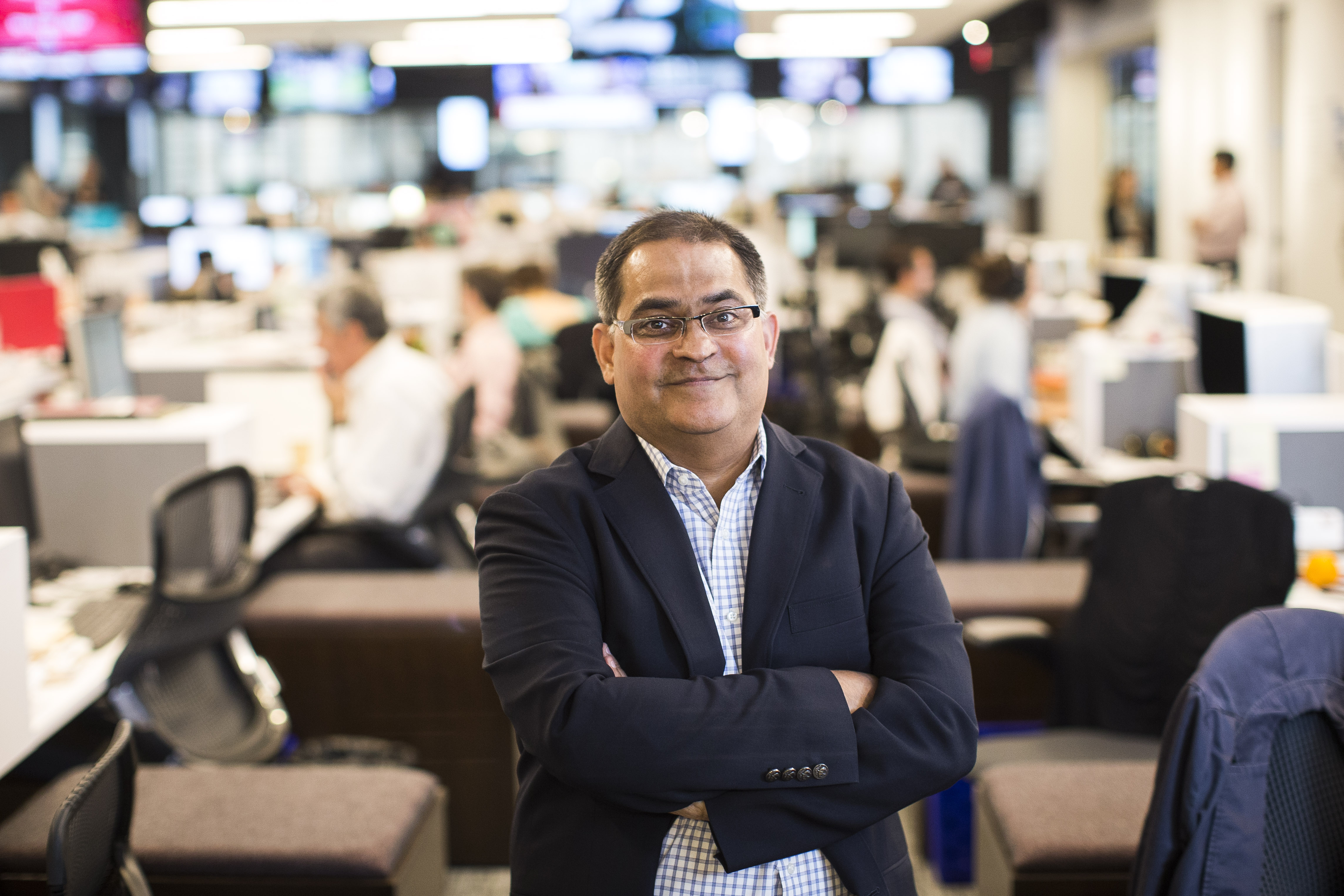 Boston Globe CFO Vinay Mehra in the company's offices in Boston.